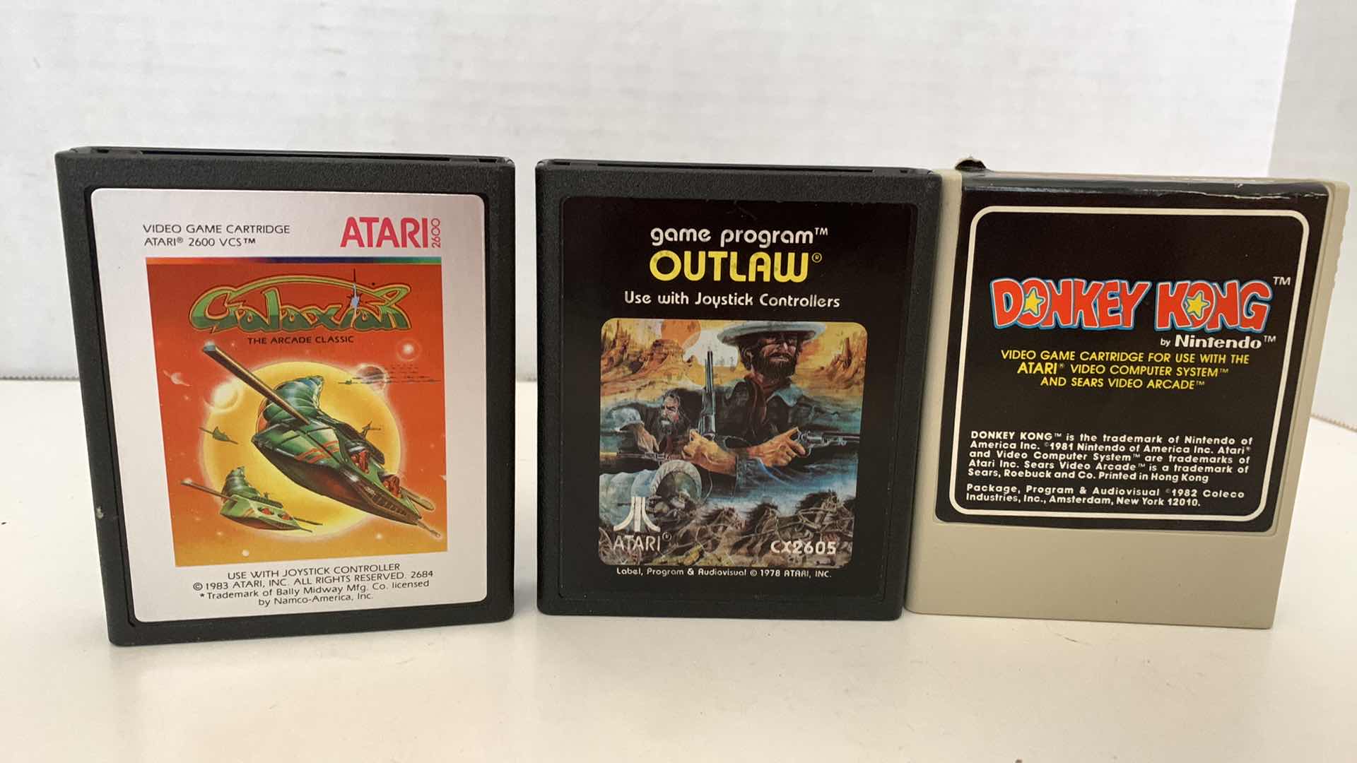 Photo 1 of 3 PCS VINTAGE ATARI 2600 GAMES: gALAXIAN,oUTLAW, AND DONKEY KONG