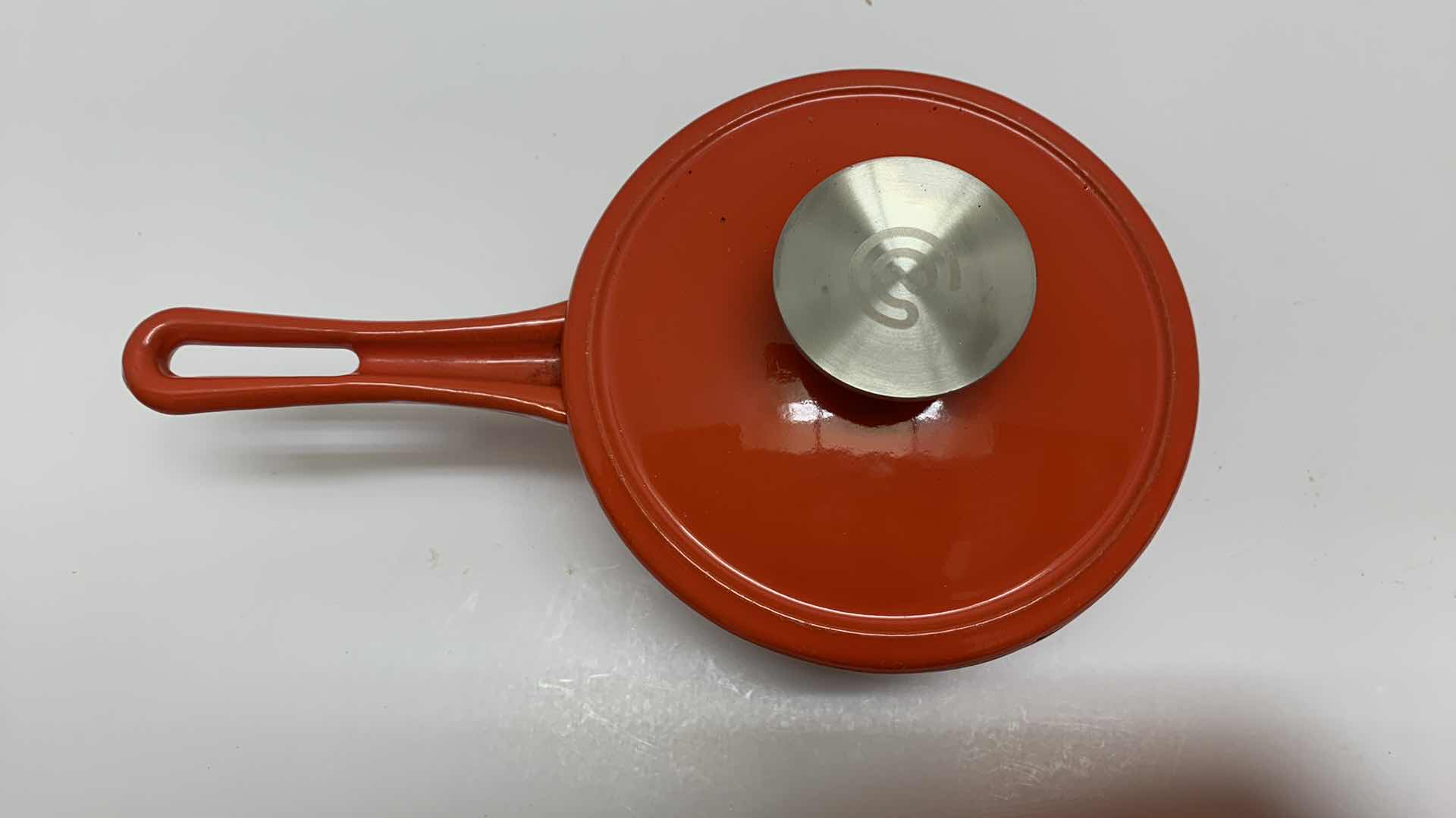 Photo 2 of CAST IRON RED SAUCE PAN 5.75” WIDE