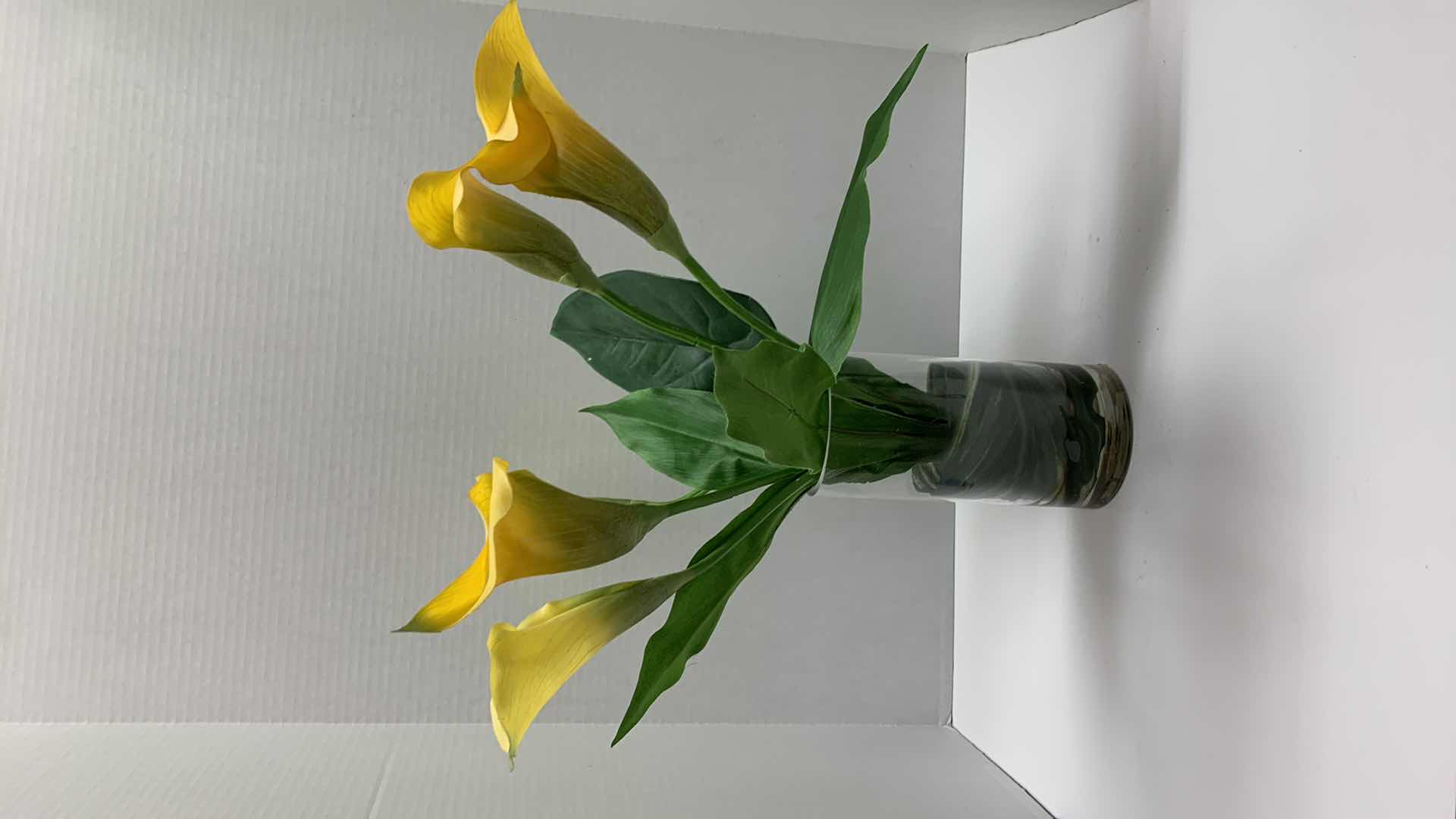 Photo 1 of ARTIFICIAL YELLOW CALLA LILY ARRANGEMENT