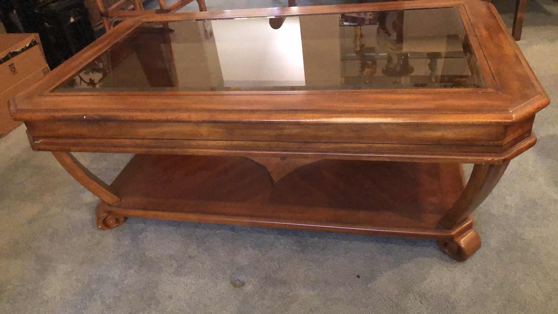 Photo 1 of MAHOGANY COFFEE TABLE W SMOKE GLASS INSET 50” X 30” H 9”