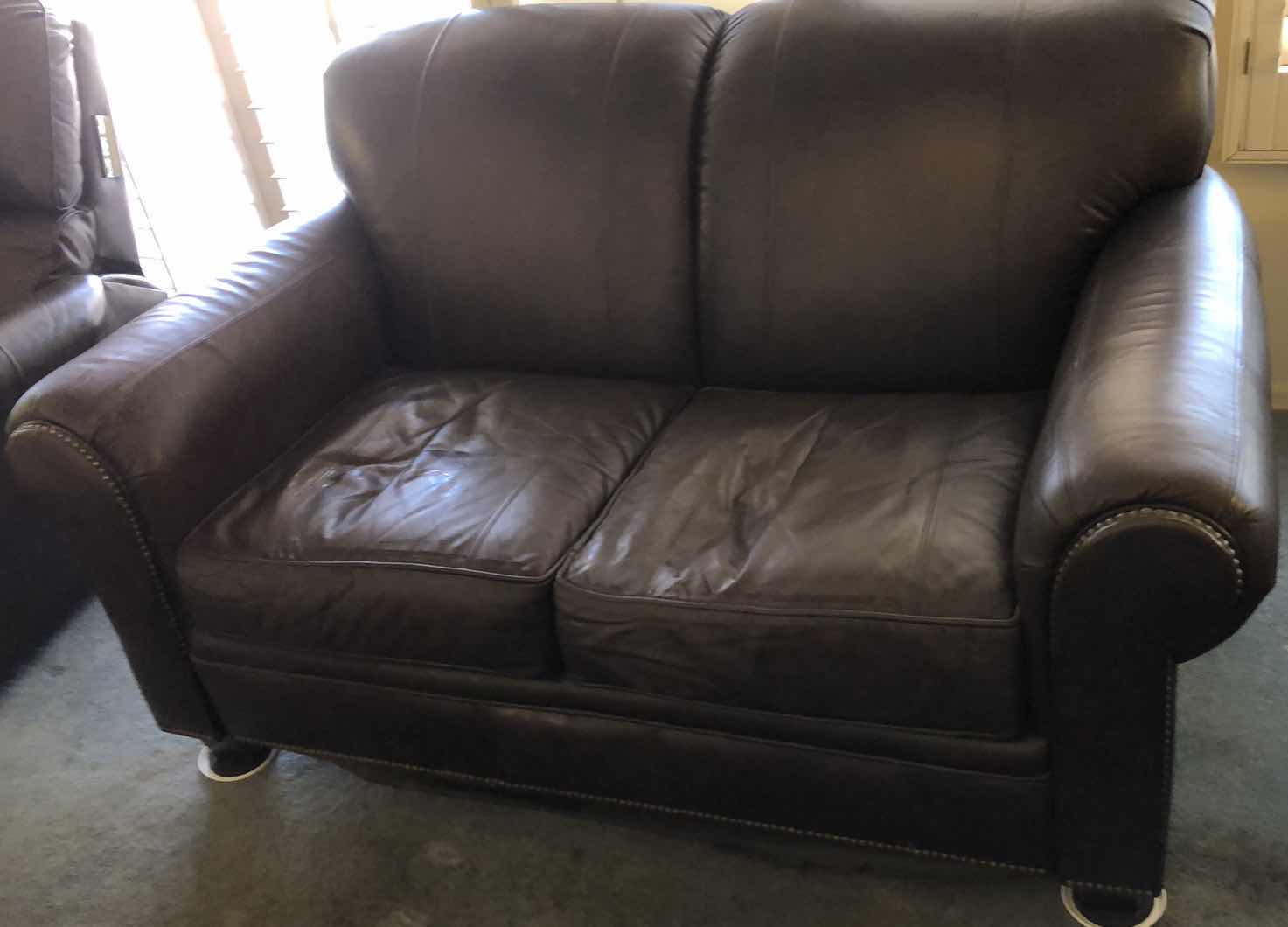 Photo 1 of LEATHER NAIL HEAD LOVE SEAT 63” X 38” H 36”