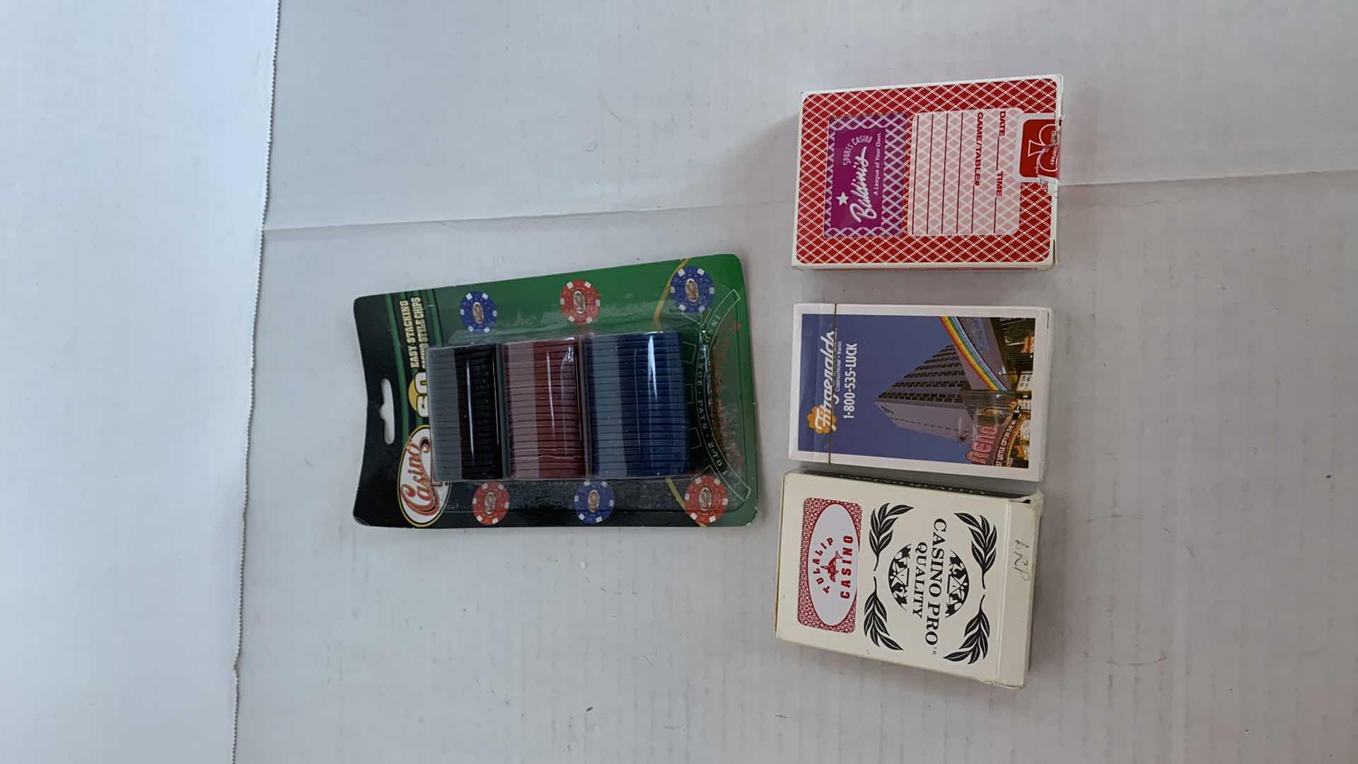 Photo 1 of LAS VEGAS CASINO PLAYING CARDS AND POKER CHIPS AND CRAPS CLOTH