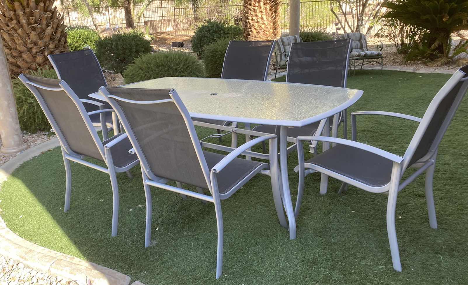 Photo 1 of 7-PIECE ALUMINUM TABLE AND CHAIR SET WITH GLASS TOP 71“ x 42” H 27”