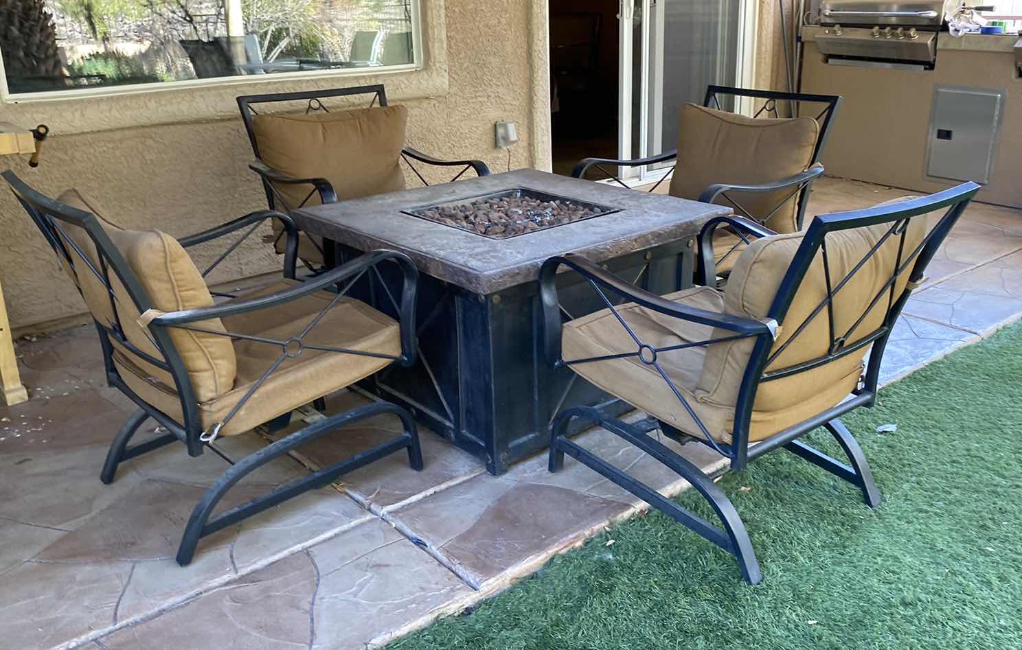 Photo 1 of 5 PIECE PATIO SET 4 CHAIRS AND FIREPIT UNTESTED