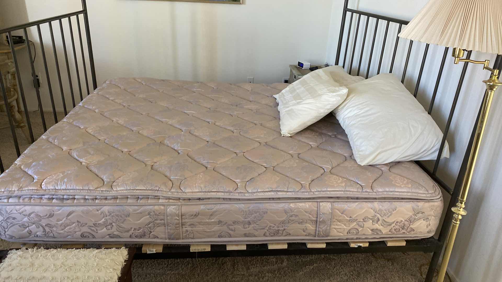 Photo 2 of KING IRON BED WITH SIMMONS MATTRESS 76” X 87” H 56”