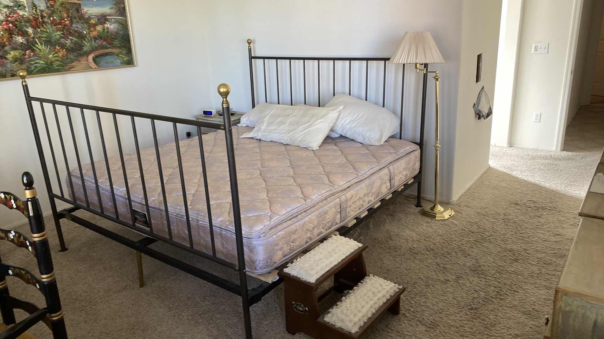 Photo 1 of KING IRON BED WITH SIMMONS MATTRESS 76” X 87” H 56”