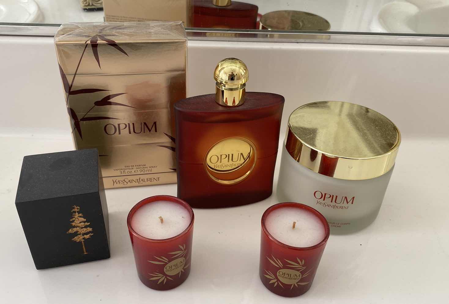 Photo 1 of NEW OPIUM PARFUM 3 oz AND OPEN BOTTLE  ALMOST FULL AND MORE