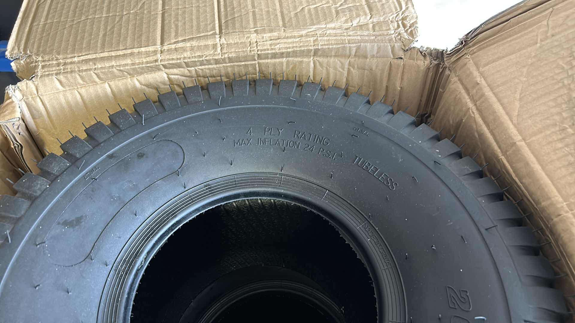 Photo 1 of BOX OF 2 - 4 PLY TUBELESS TIRES - 20 X 10-8