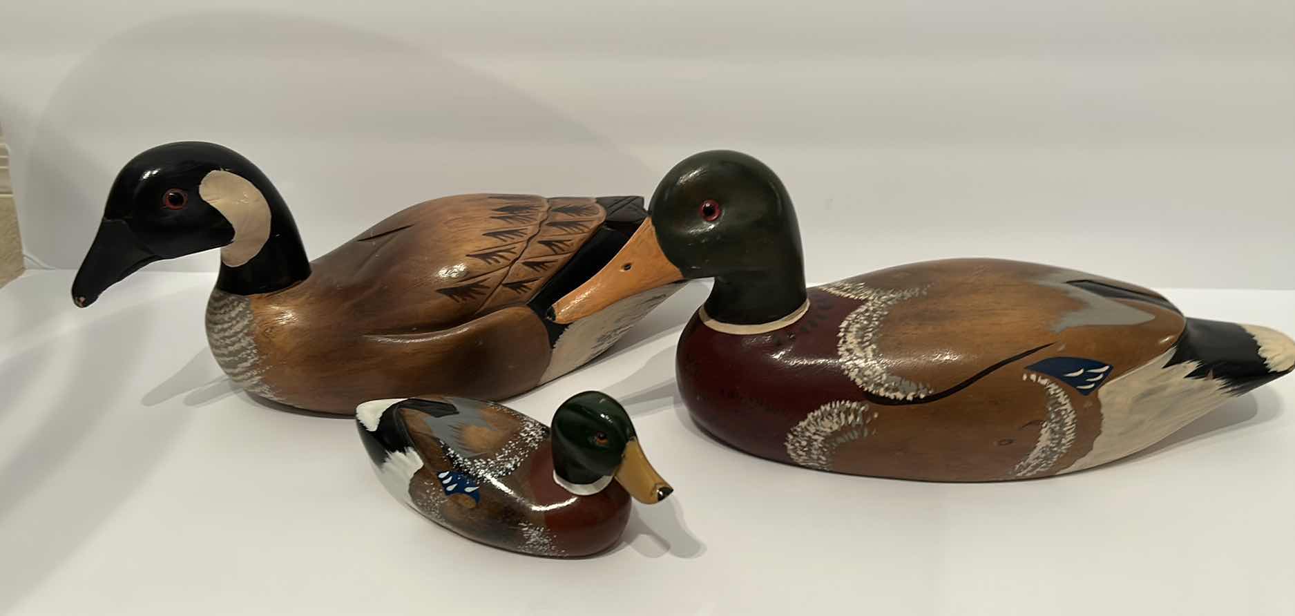 Photo 8 of 3 - WOOD HANDPAINTED DECOY DUCKS LARGEST 15”