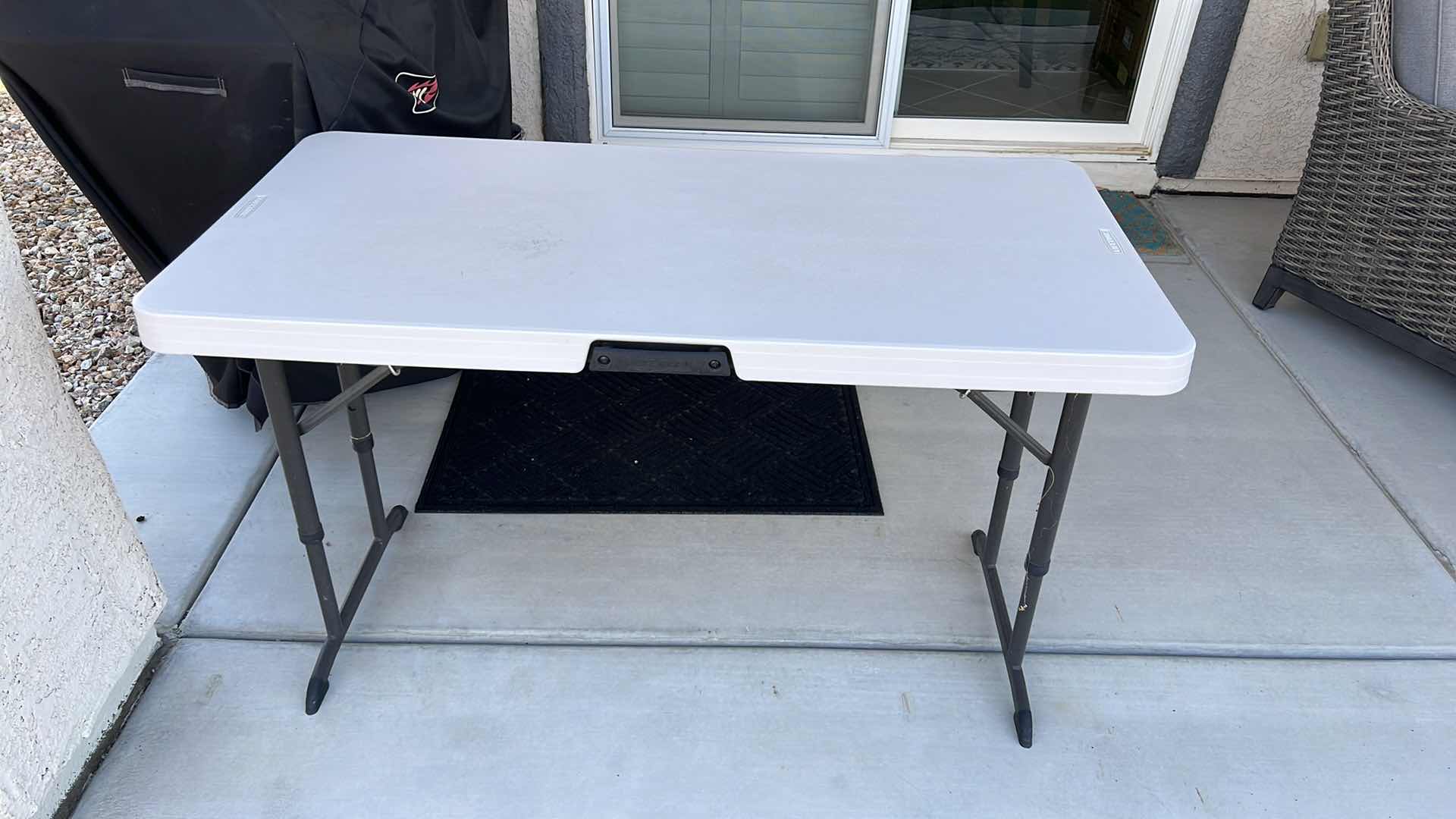 Photo 1 of LIFETIME 4FT FOLDING TABLE