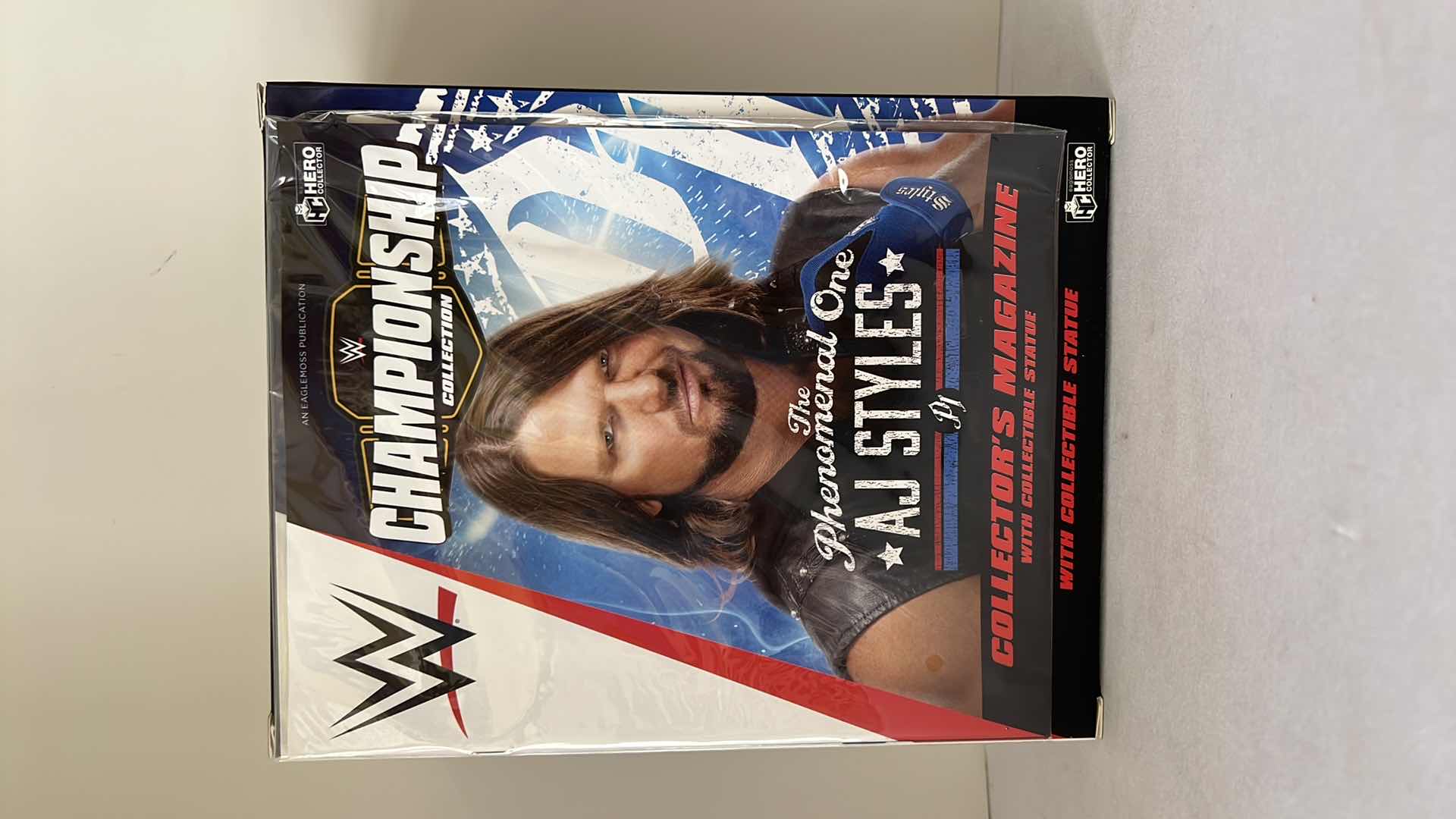 Photo 1 of BRAND NEW CHAMPIONSHIP COLLECTION WWE “AJ STYLES” COLLECTORS MAGAZINE W COLLECTIBLE STATUE