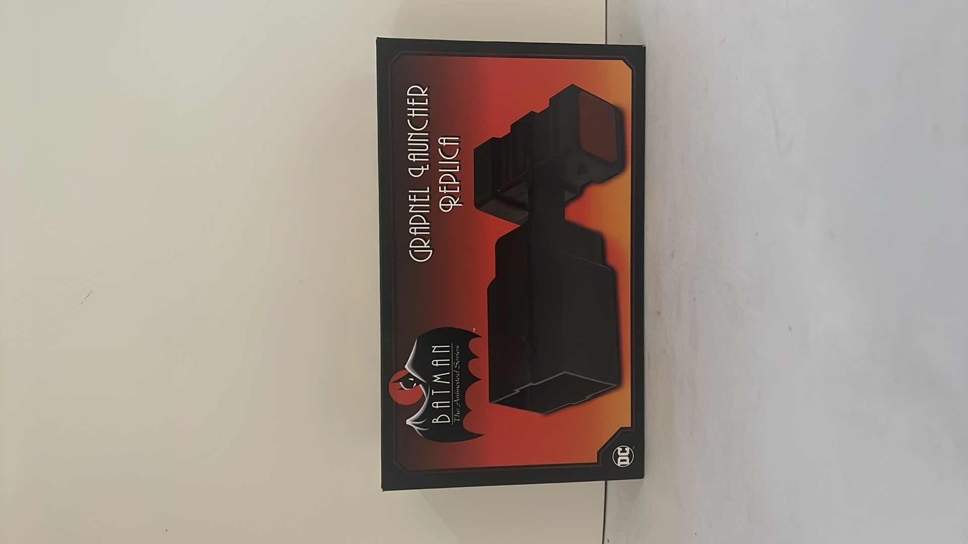 Photo 1 of BRAND NEW DC COMIC BATMAN THE ANIMATED SERIES “GRAPNEL LAUNCHER REPLICA” $25