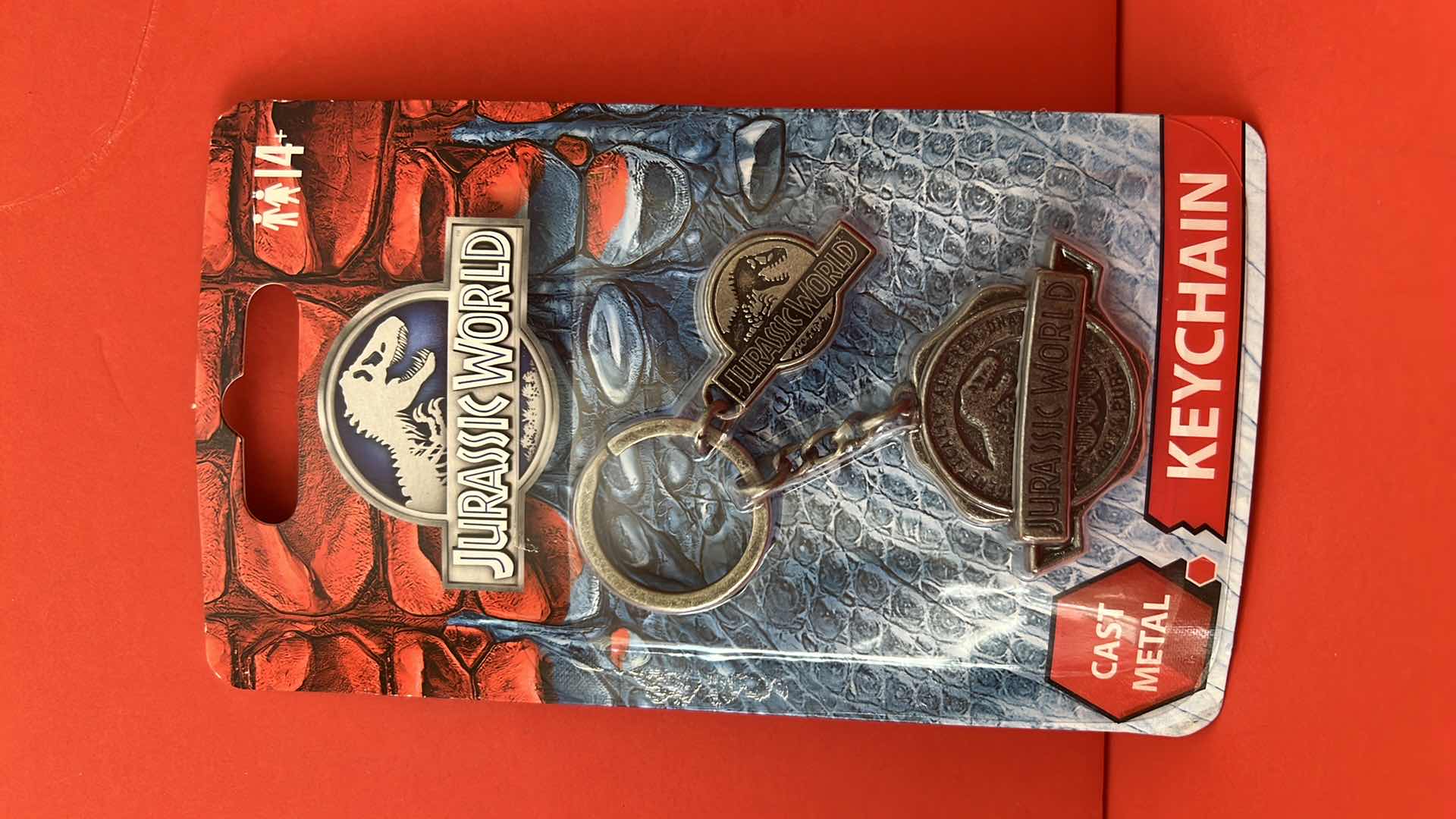 Photo 1 of BRAND NEW JURASSIC WORLD CAST METAL LOGO KEYCHAIN