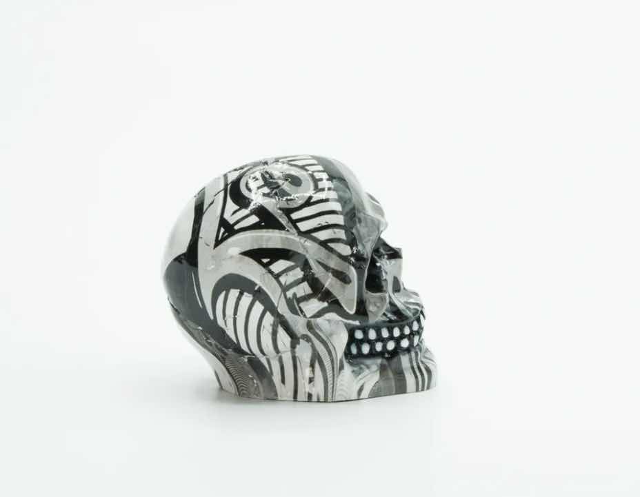 Photo 3 of BRANI BLACK & WHITE SMALL RESIN SKULL 2” x 3” x 3”