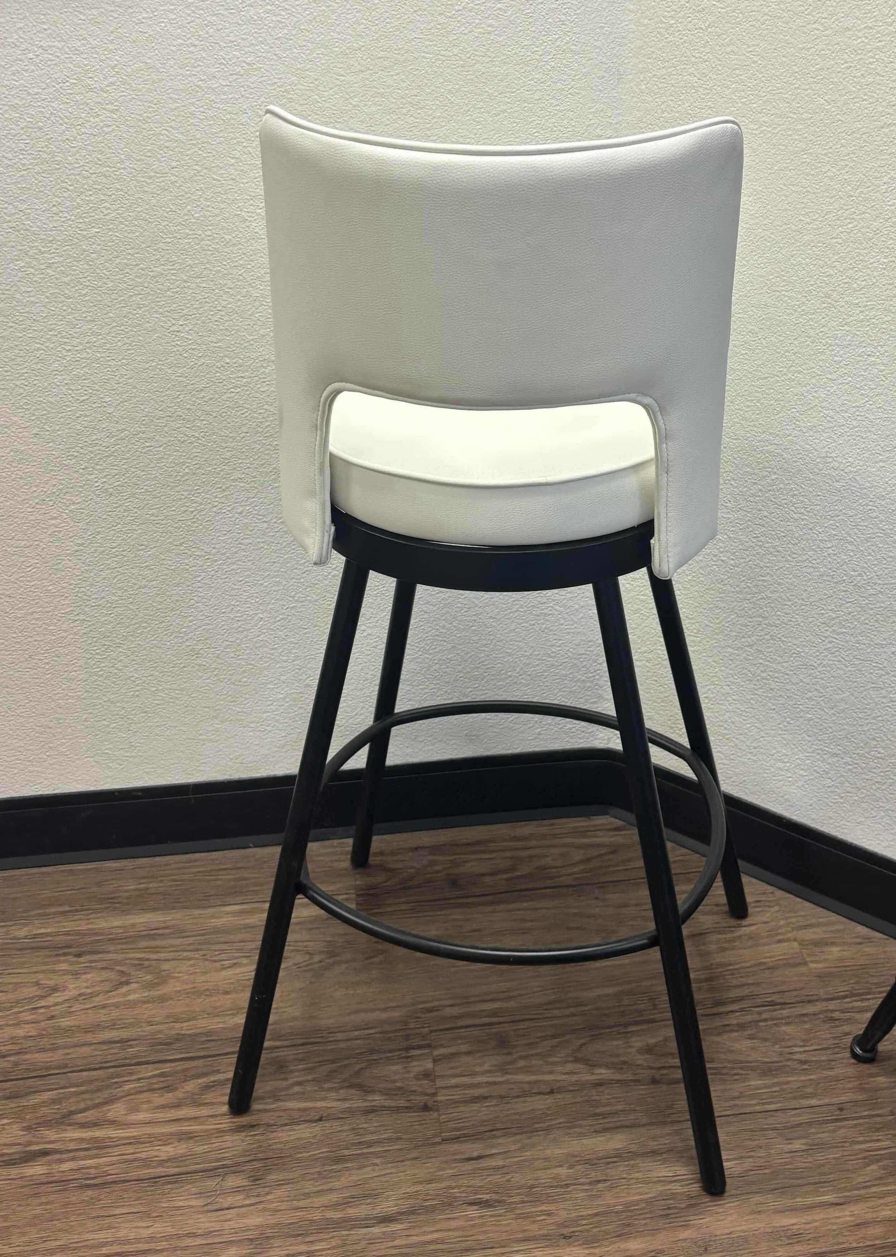 Photo 3 of VILLAGE CASA WHITE LEATHER SWIVEL BAR CHAIR W POWDER COATED BLACK LEGS (17” W x 21” D x 41” H). 