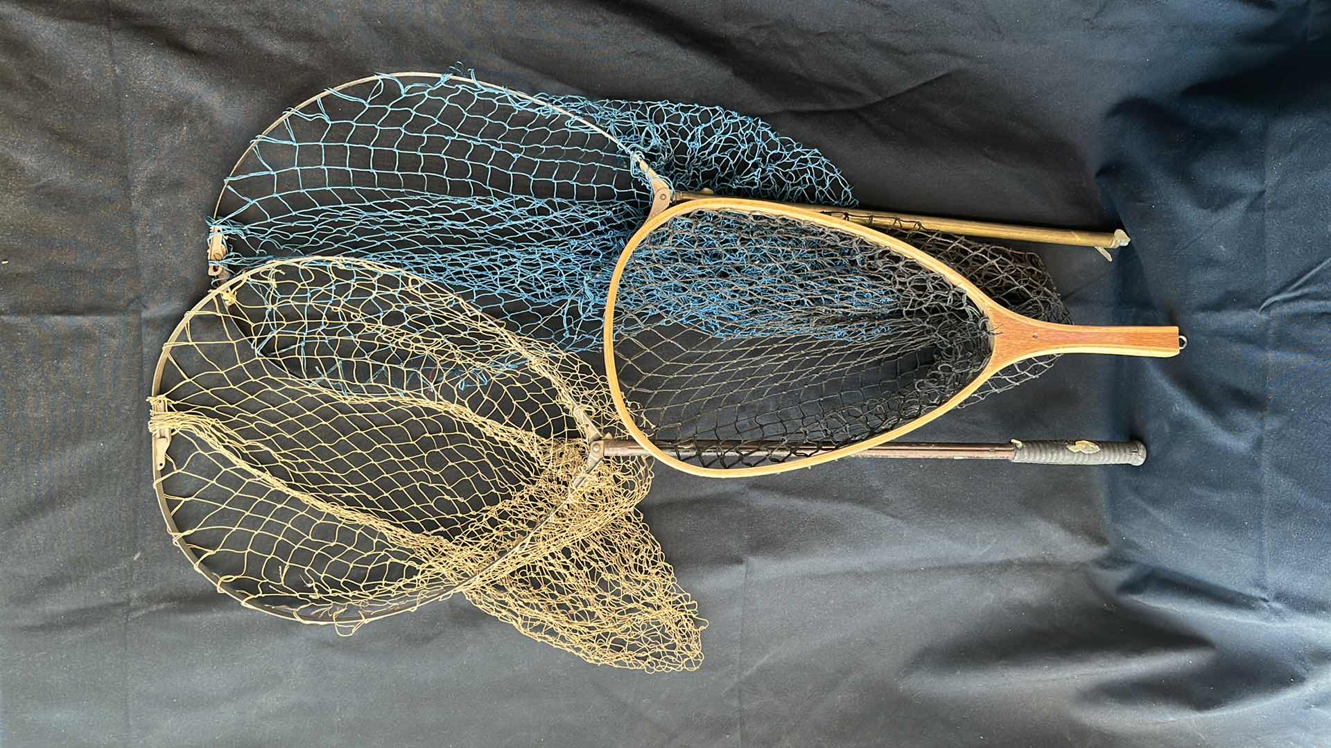 Photo 1 of VINTAGE FISHING NETS VARIOUS SIZES (3)