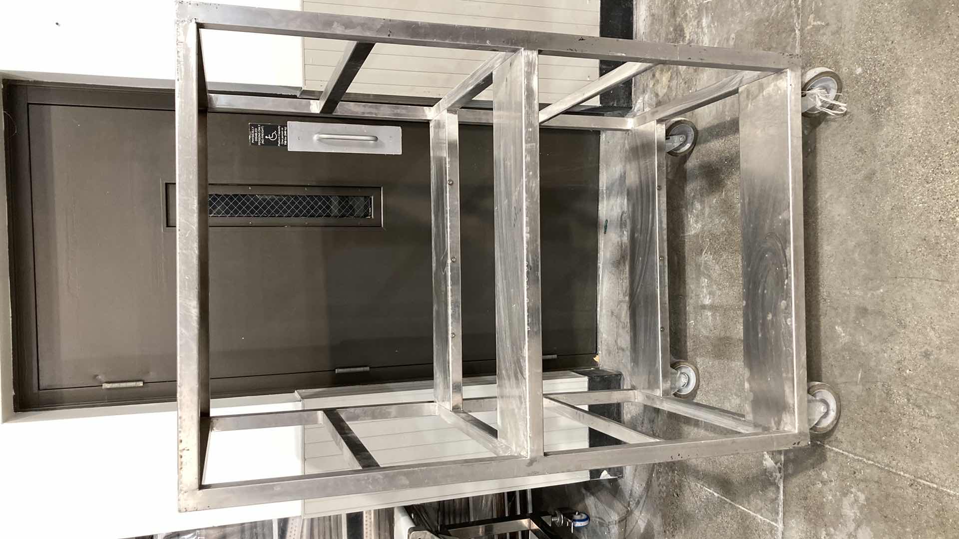 Photo 1 of STAINLESS STEEL ROLLING RACK 36.30” X 30” H 61”