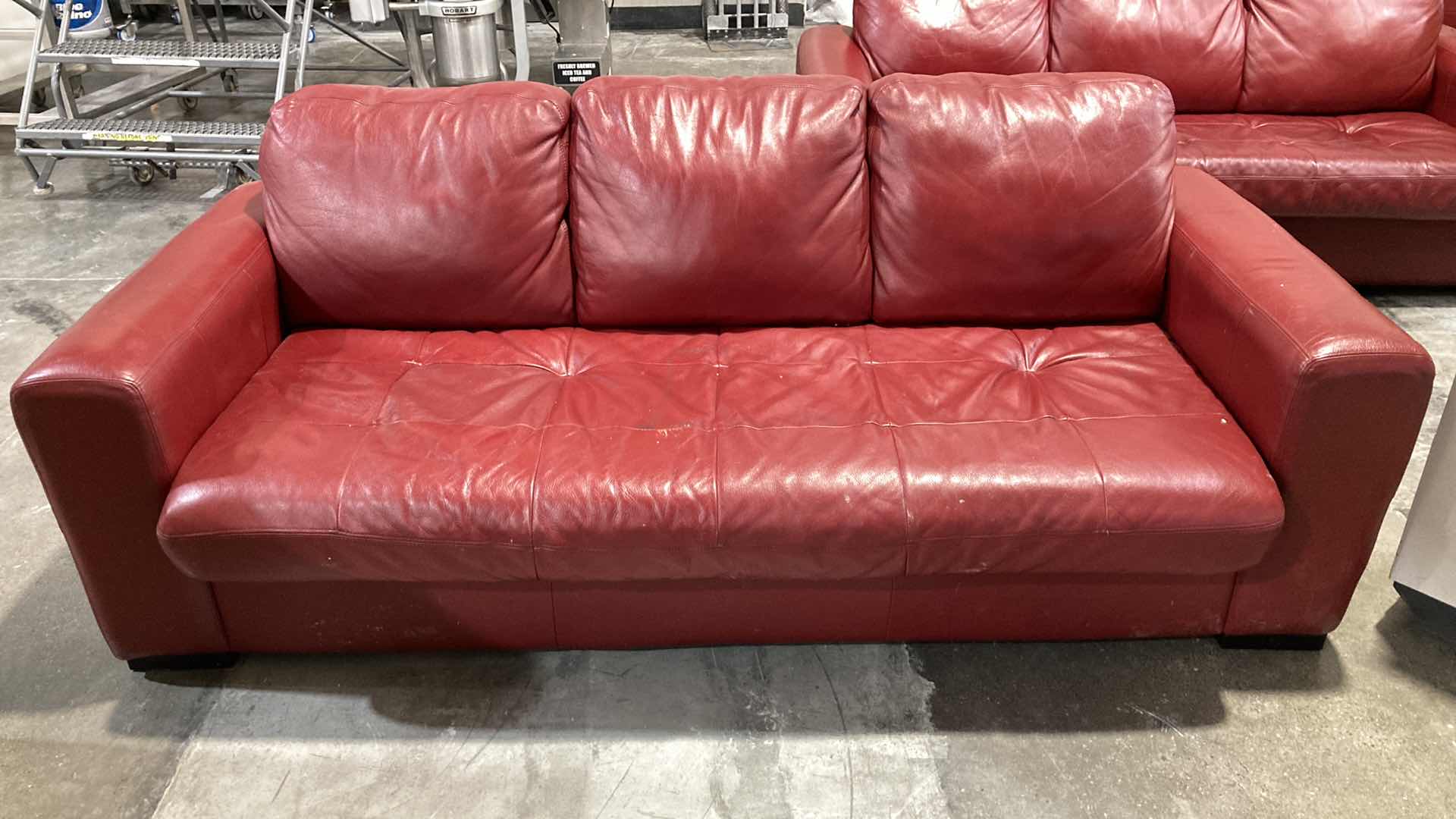 Photo 1 of F.D. STUDIOS ARTIFICIAL LEATHER RED SOFA 86” X 38” H 34” (DISPLAY MODEL)