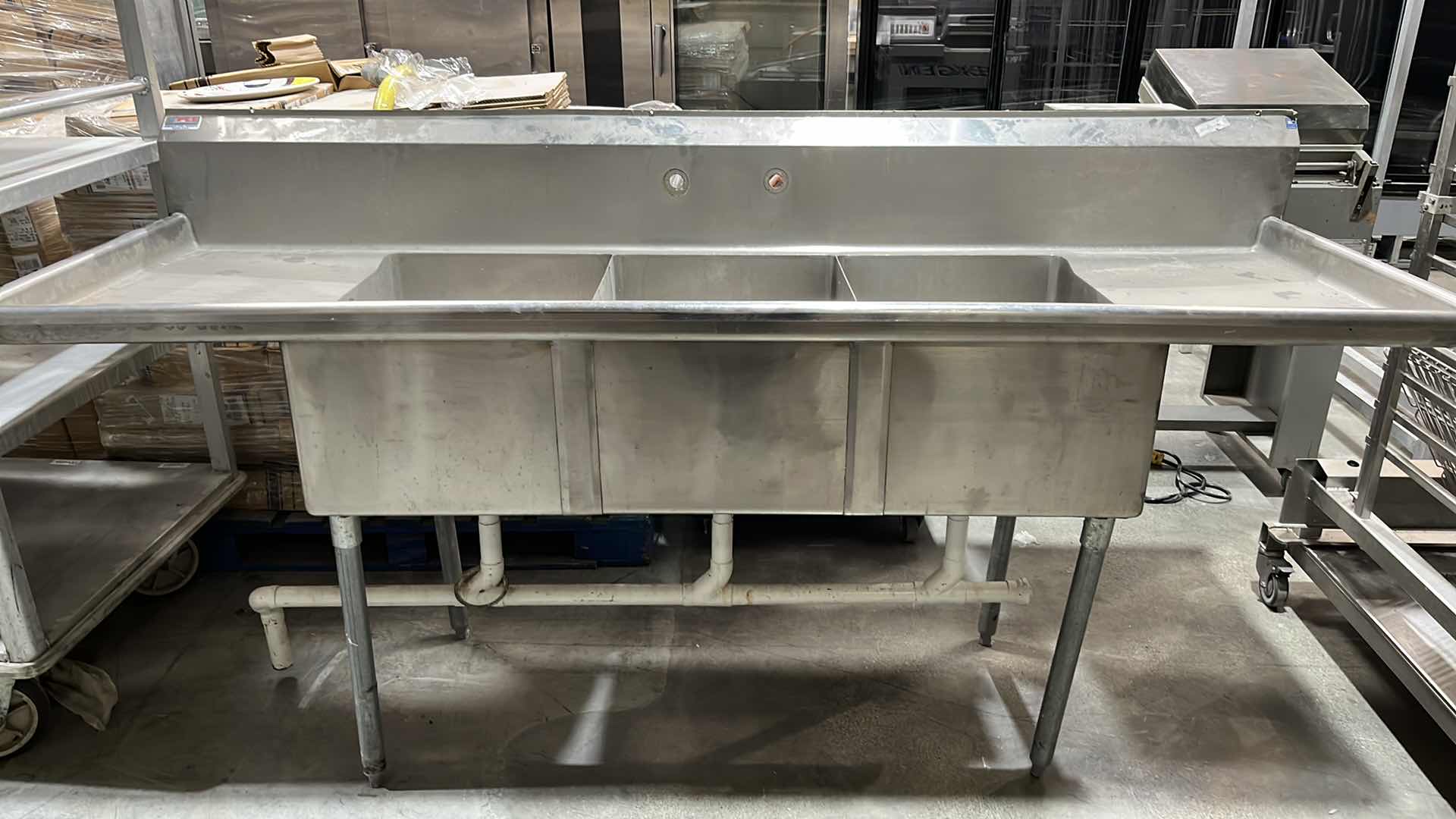 Photo 1 of STAINLESS STEEL COMMERCIAL THREE COMPARTMENT KITCHEN SINK W TWO DRAINBOARDS 29.75” X 90”