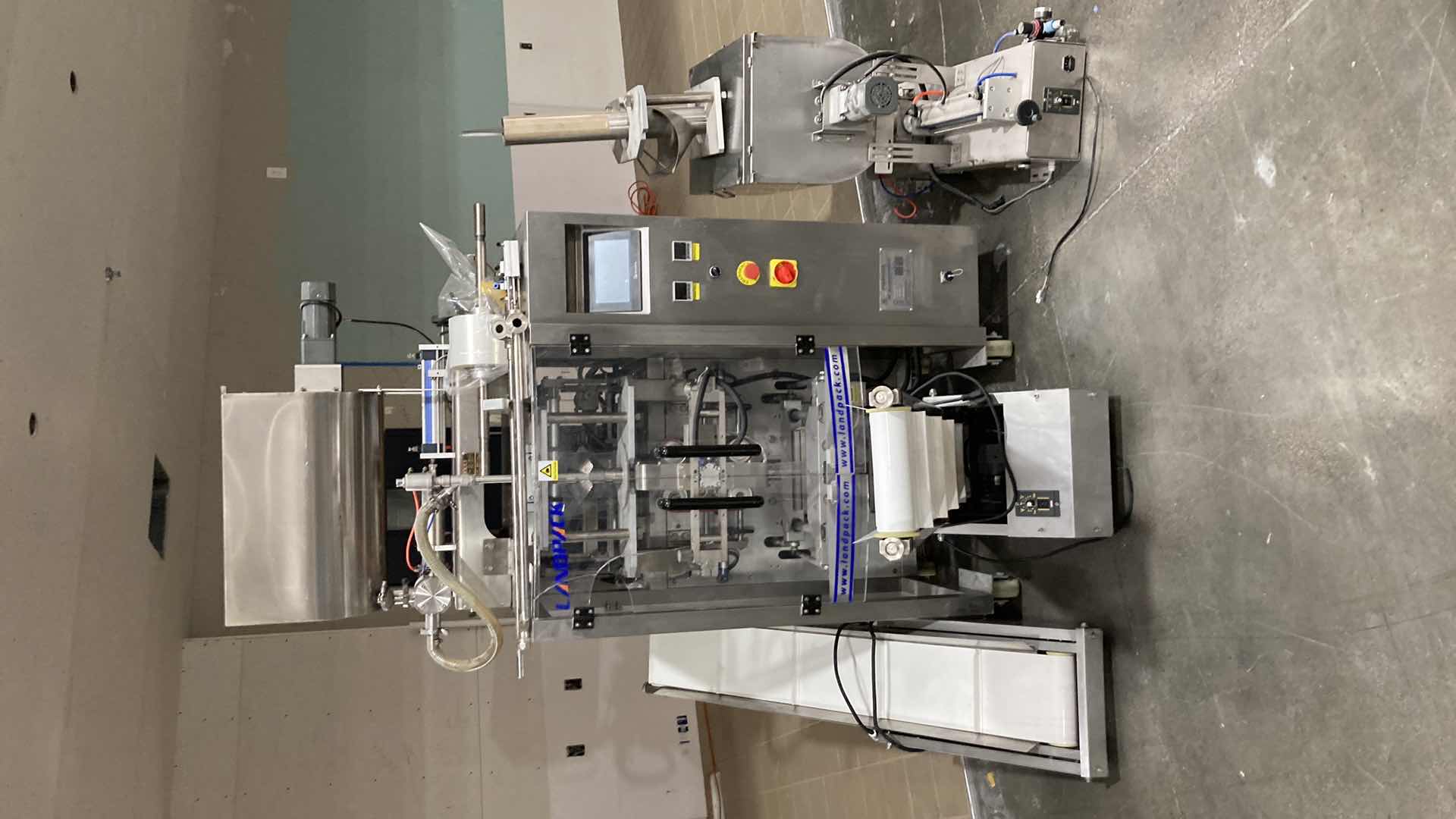 Photo 1 of LANDPACK COMMERCIAL AUTOMATIC LIQUID PACKAGING MACHINE MODEL LD-420L