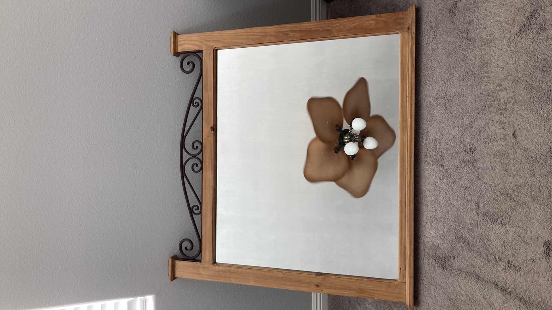 Photo 1 of WOOD FRAMED MIRROR W ACCENT WROUGHT IRON TOP 46” X 43.25”