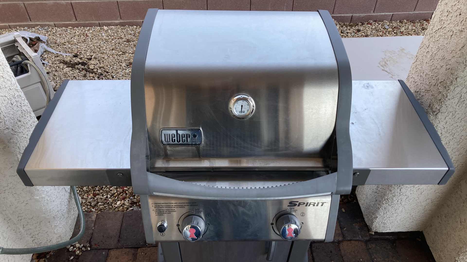 Photo 2 of WEBER SPIRIT PROPANE GAS GRILL W TANK & UTENSIL