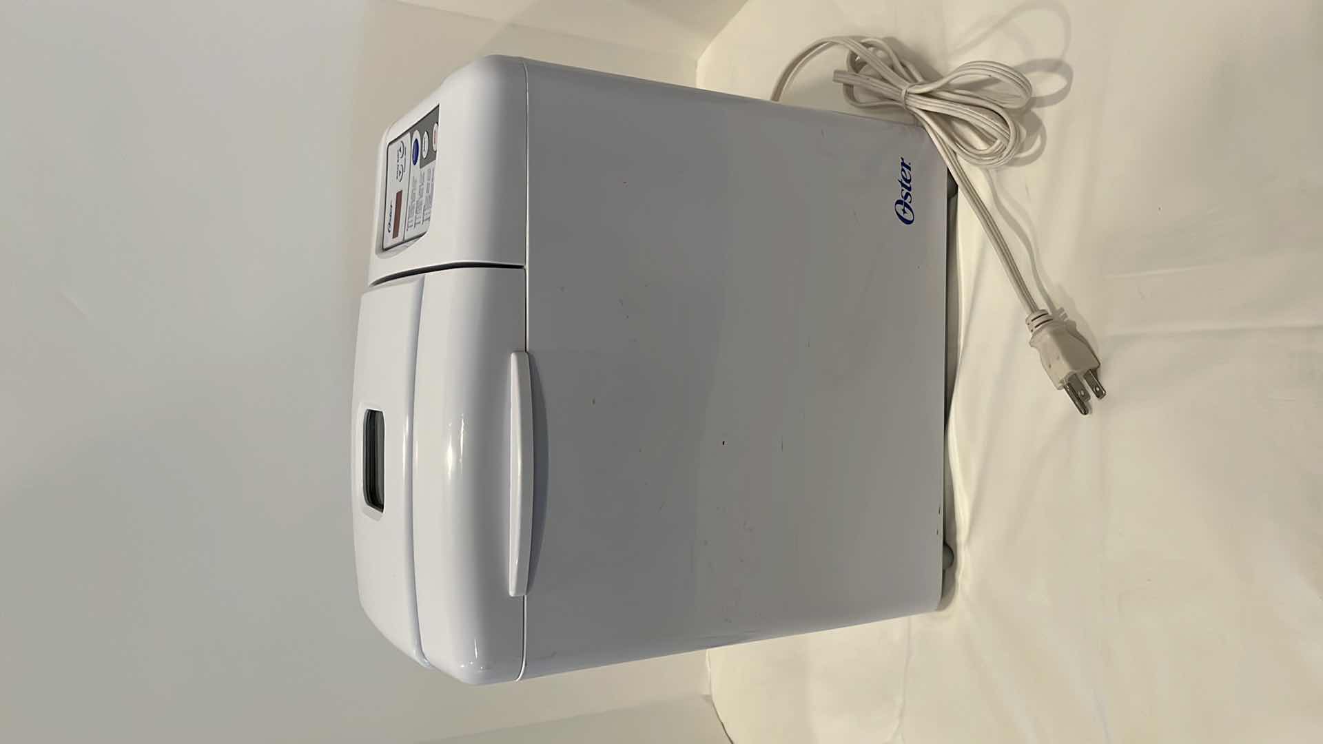 Photo 1 of OSTER AUTOMATIC BREAD MAKER MODEL 5843