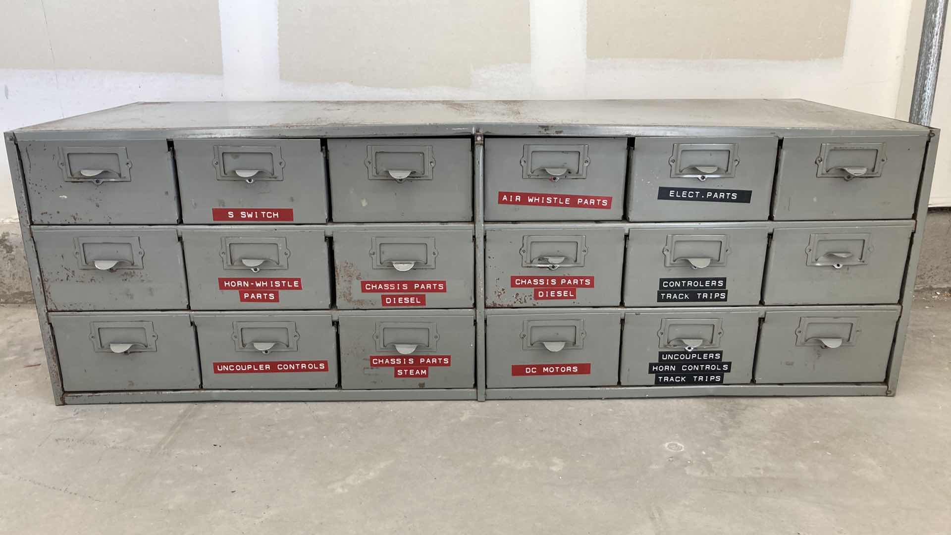 Photo 1 of 18 DRAWER STEEL STORAGE CABINET W MODEL TRAIN PARTS AS LABELED 34” X 12” H10.75”