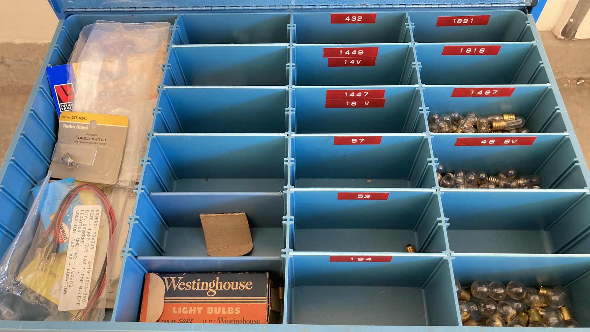 Photo 4 of BOWMAN 4 DRAWER STEEL STORAGE CABINET W MODEL TRAIN PARTS AS LABELED 20” X 16” H22”