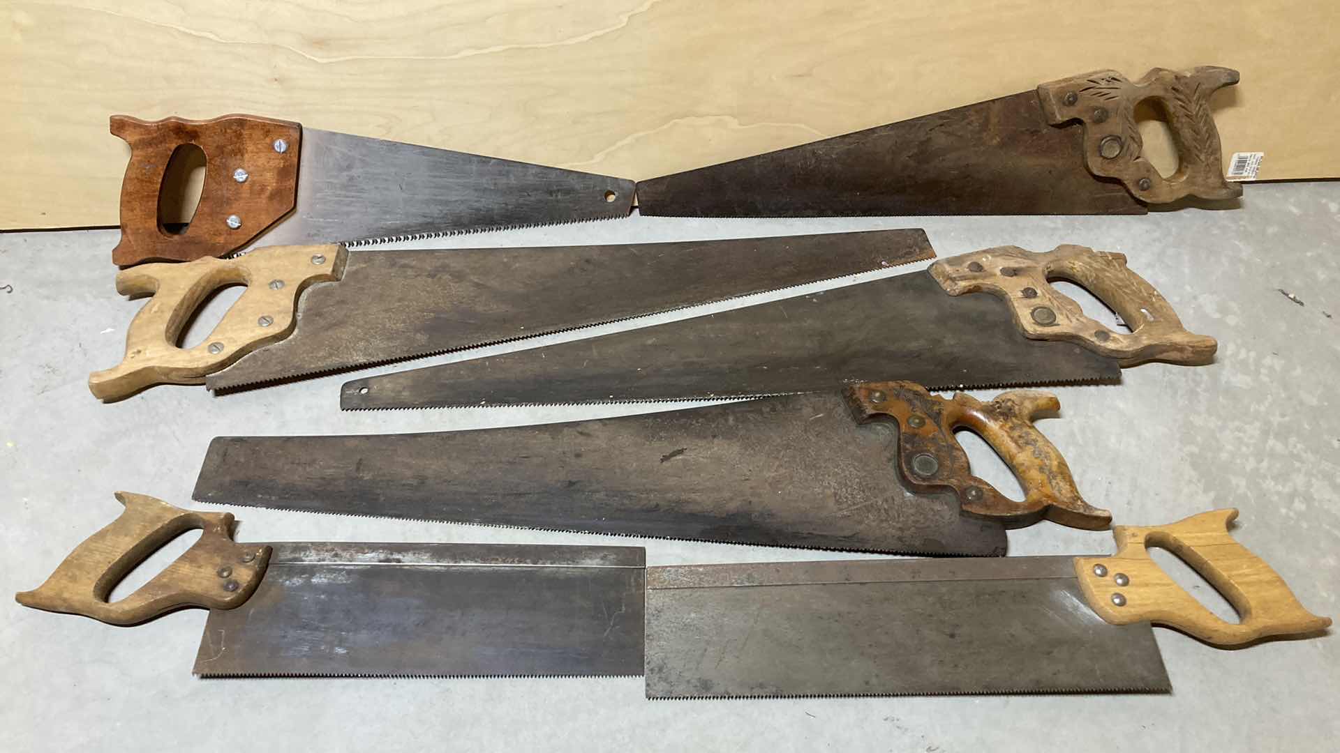 Photo 1 of MID CENTURY WOOD HANDLED SAWS (7)