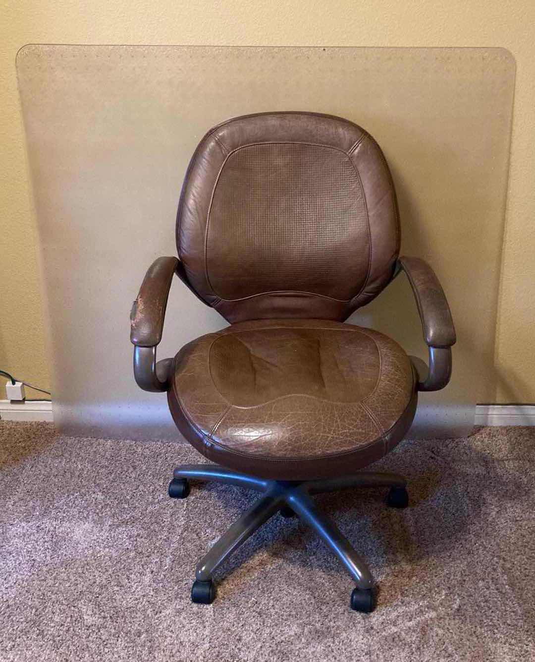 Photo 1 of TRUE SEATING BROWN LEATHER ROLLING OFFICE W PLASTIC ROLL MAT