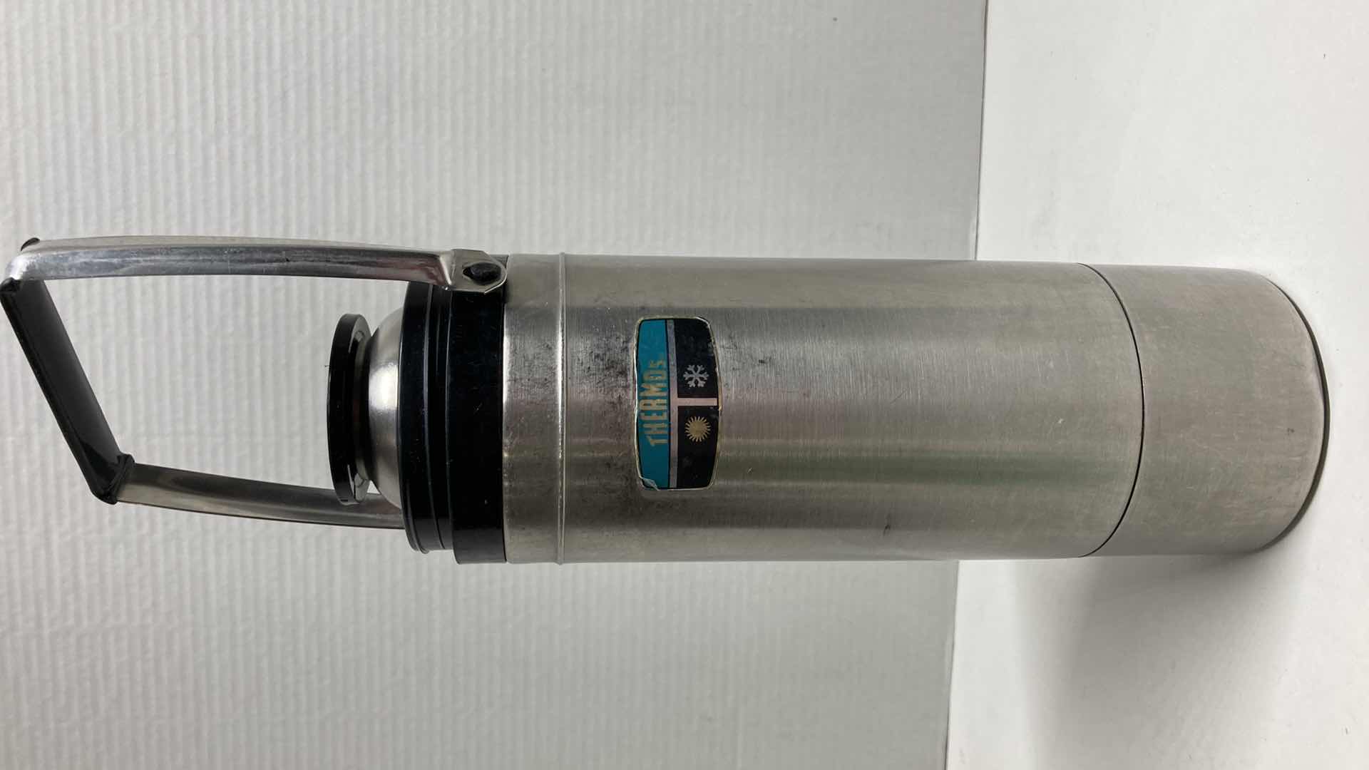 Photo 1 of THERMOS STAINLESS STEEL VACUUM 1QT BOTTLE MODEL 2464