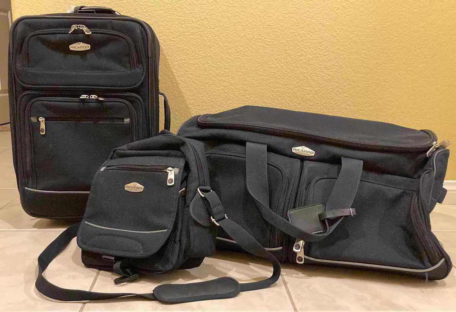 Photo 1 of RICARDO BLACK LUGGAGE SET- ROLLING CARRY ON BAG, SHOULDER BAG & DUFFLE BAG (3)