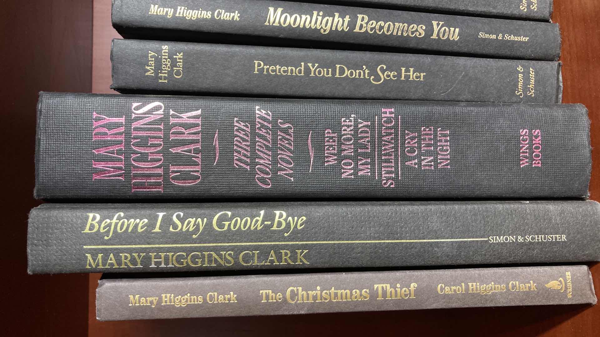 Photo 2 of MARY HIGGINS CLARK LEATHER HARD COVER BOOKS (8)