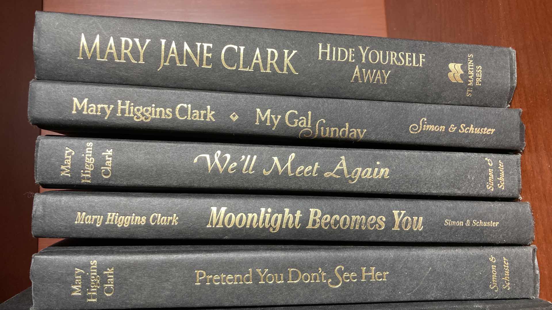 Photo 3 of MARY HIGGINS CLARK LEATHER HARD COVER BOOKS (8)