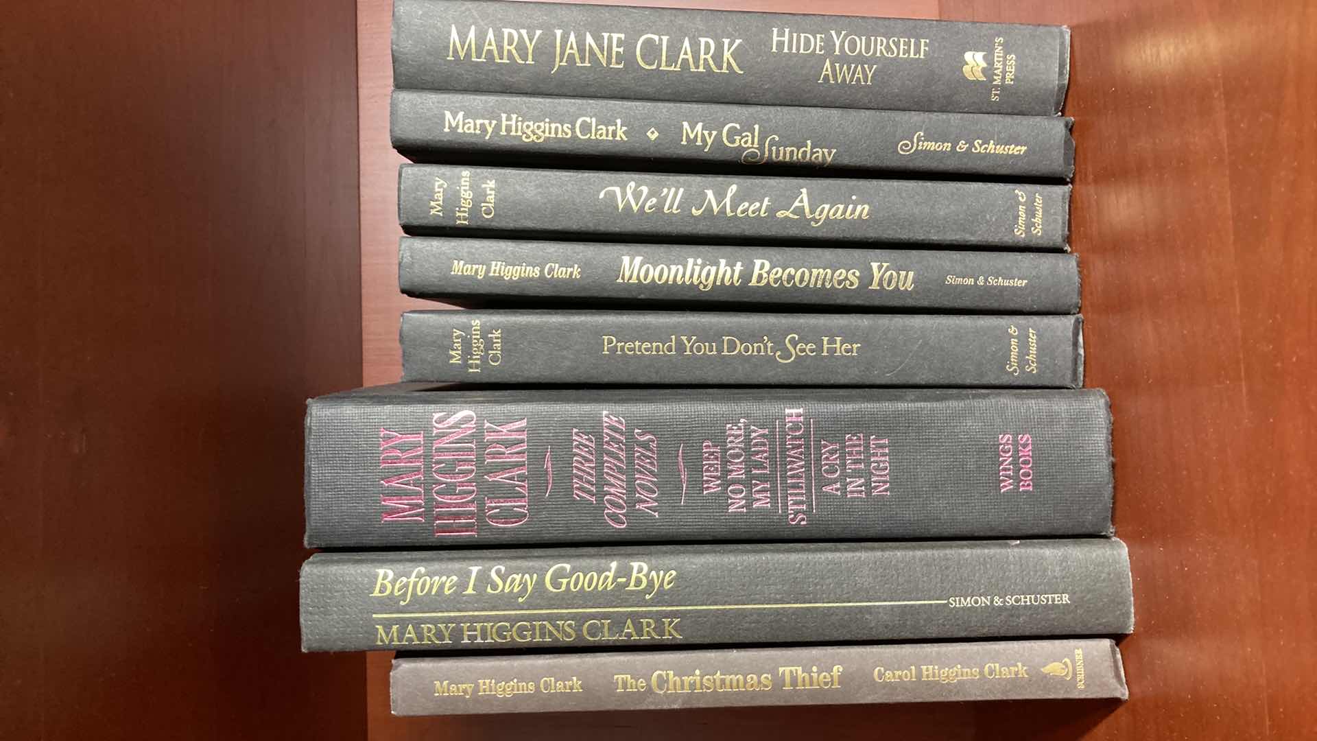 Photo 1 of MARY HIGGINS CLARK LEATHER HARD COVER BOOKS (8)