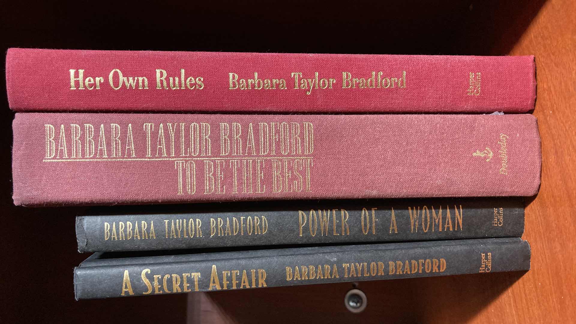 Photo 1 of TAYLOR BRADFORD LEATHER HARD COVER BOOKS (5)