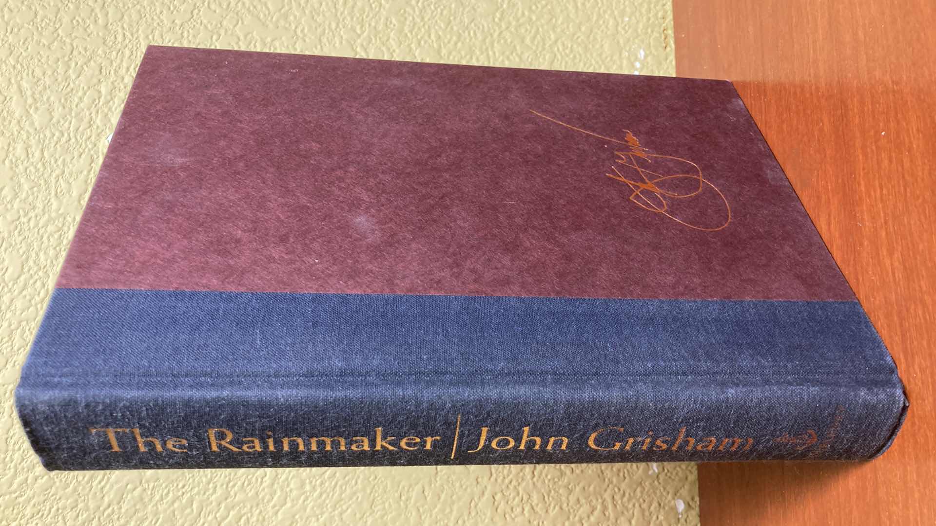 Photo 1 of THE RAINMAKER AUTOGRAPHED BY JOHN GRISHAM HARD COVER BOOK