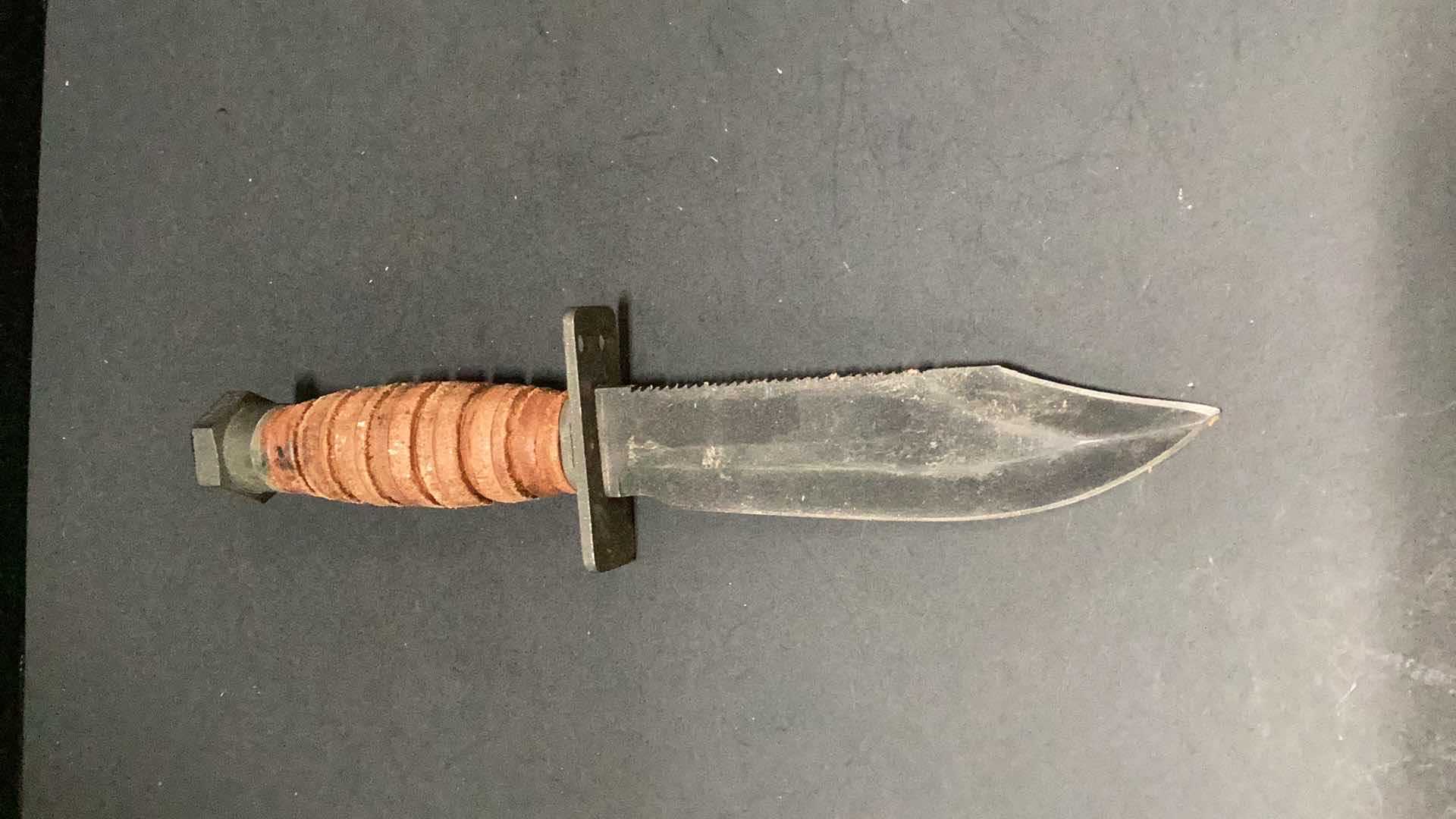 Photo 2 of LEATHER HANDLED 9” KNIFE