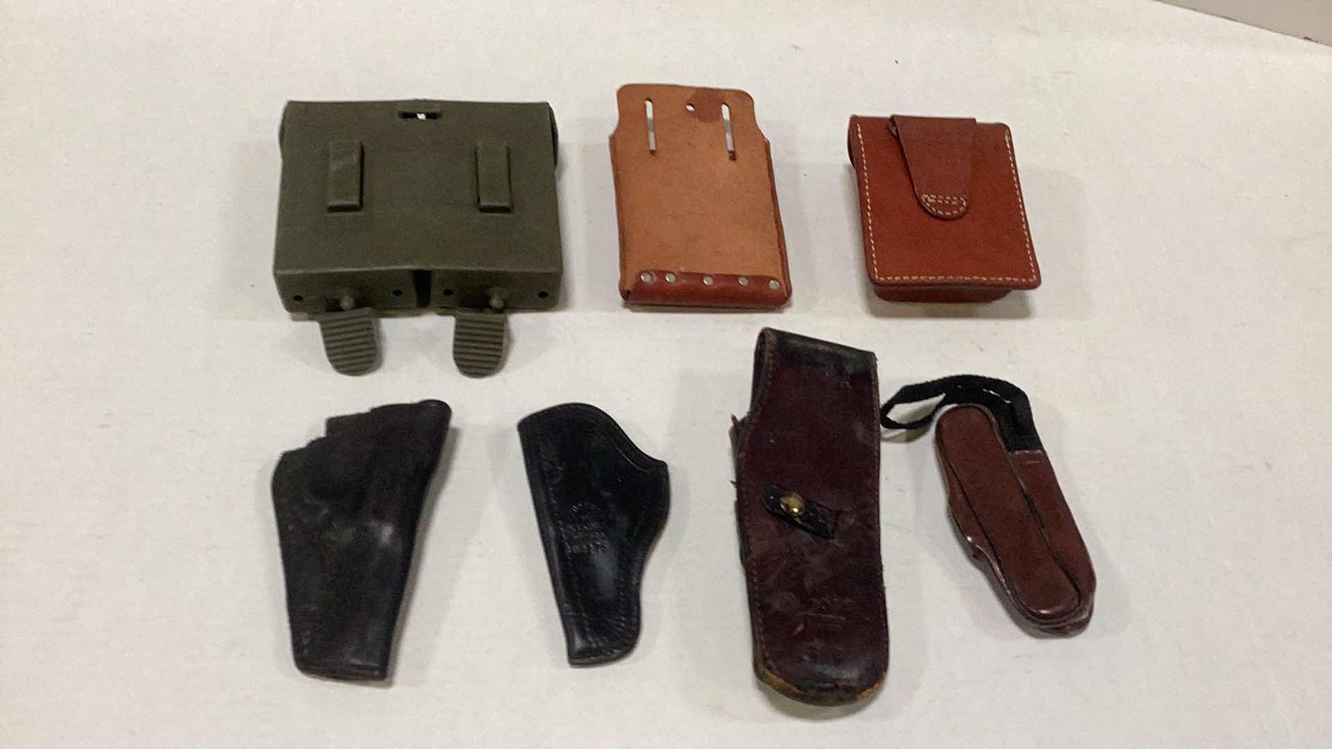 Photo 2 of HOLSTERS AND ASSORTED GOODS