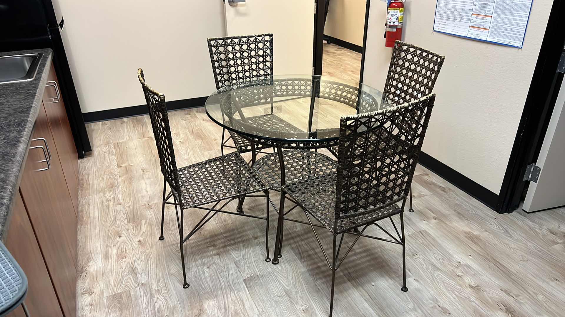 Photo 7 of 36” ROUND CANE W GLASSTOP TABLE W 4 CANE SIDE CHAIRS