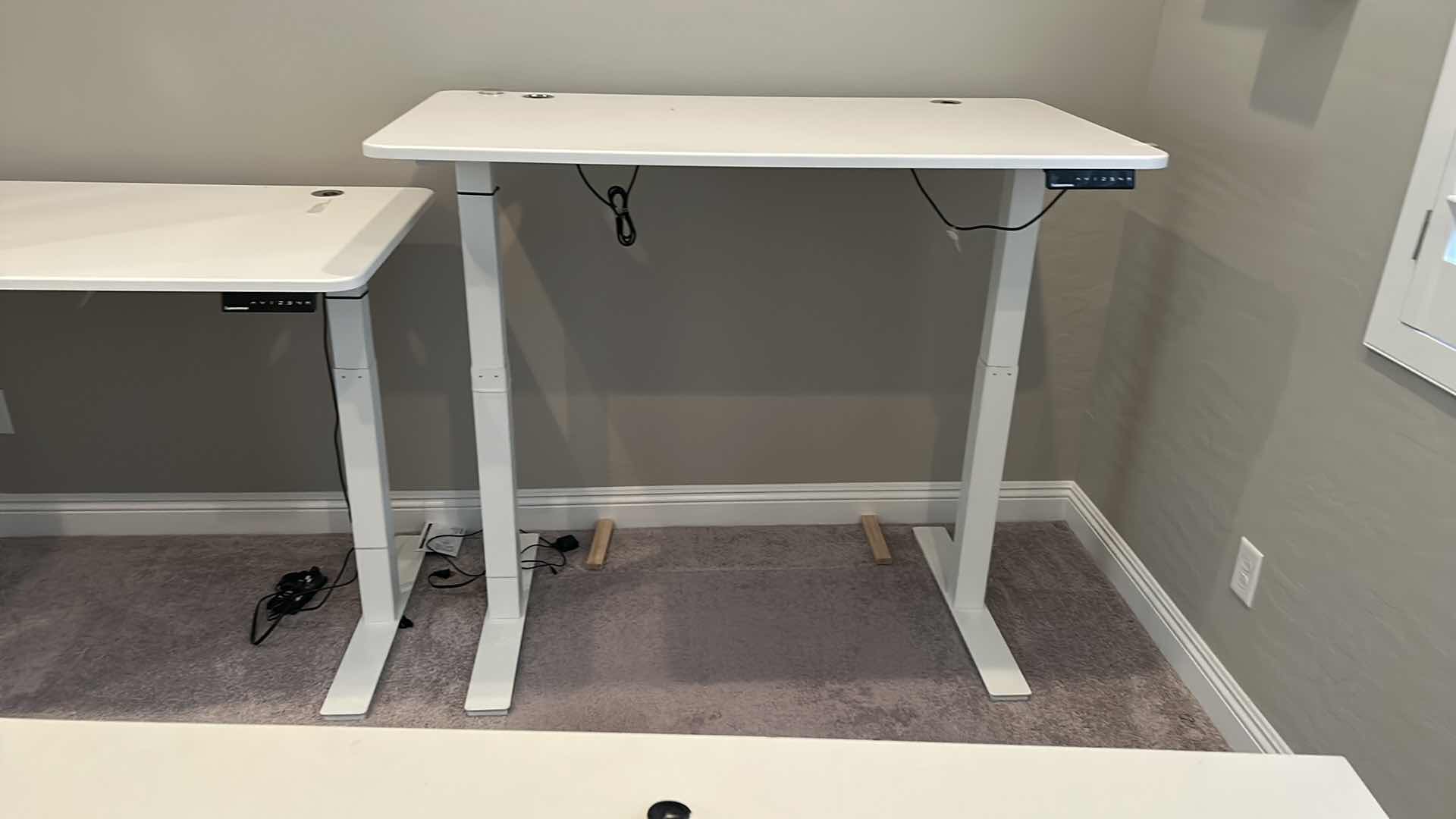 Photo 2 of ADJUSTABLE HEIGHT WORK TABLE WITH ELECTRICAL 53” x 29”