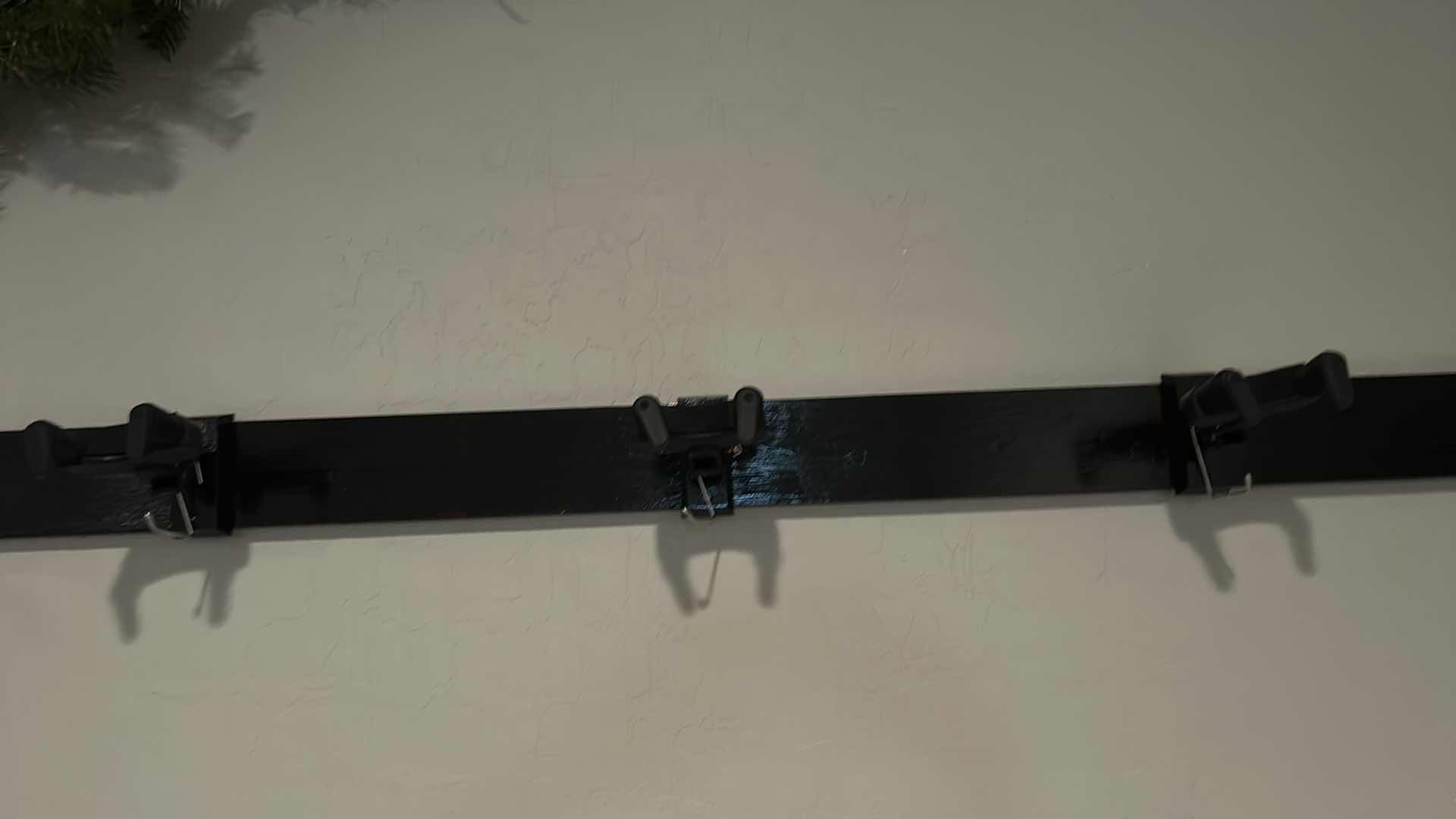 Photo 2 of 2 - WALL GUITAR RACKS 1 x 4 PAINTED BOARDS W GUITAR HOLDERS LENGTH 14’ 11” PLUS 2,SIDE PIECES 30”