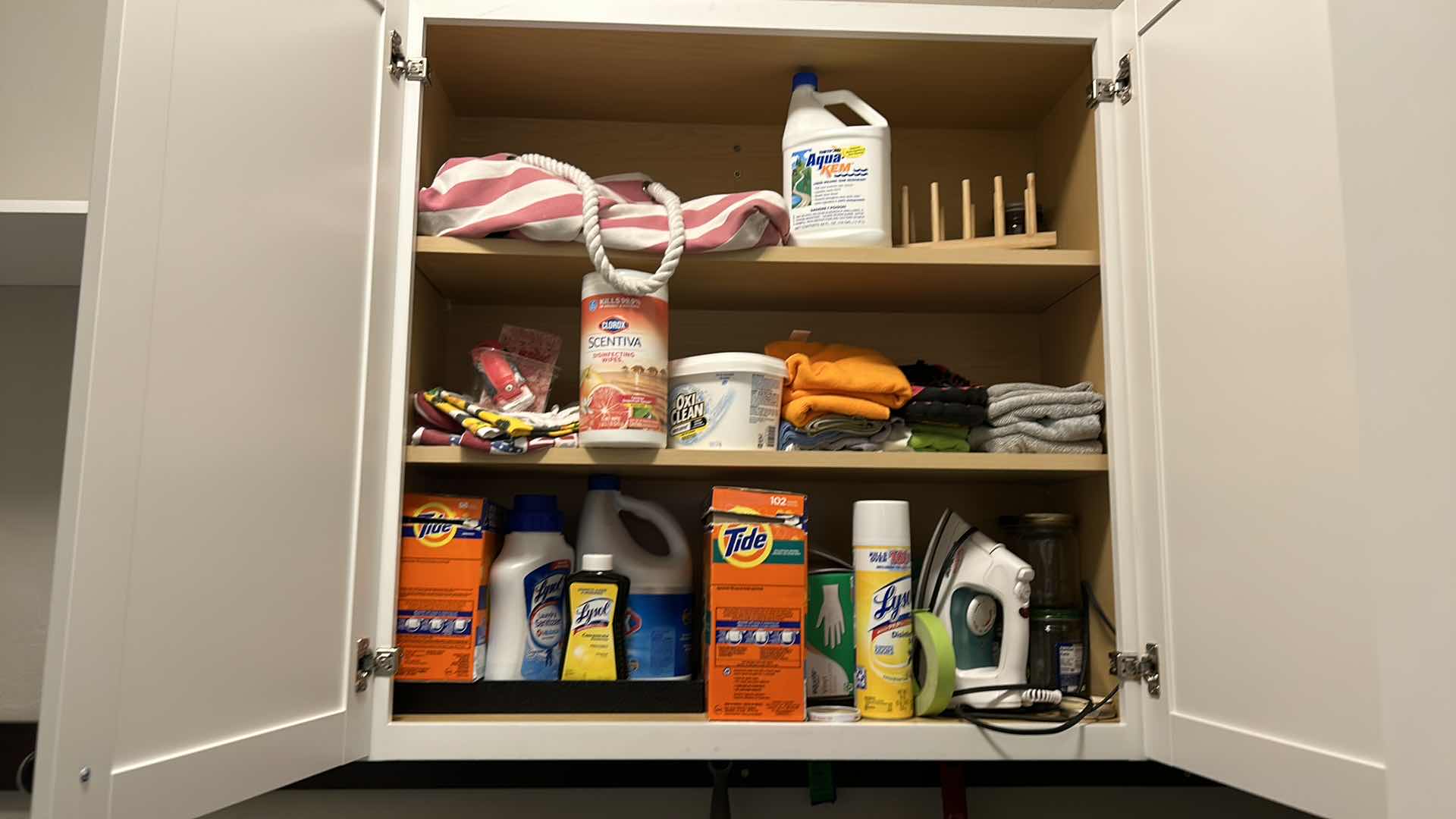 Photo 5 of CONTENTS OF CABINET IN LAUNDRY ROOM AND TOTE OF JARS