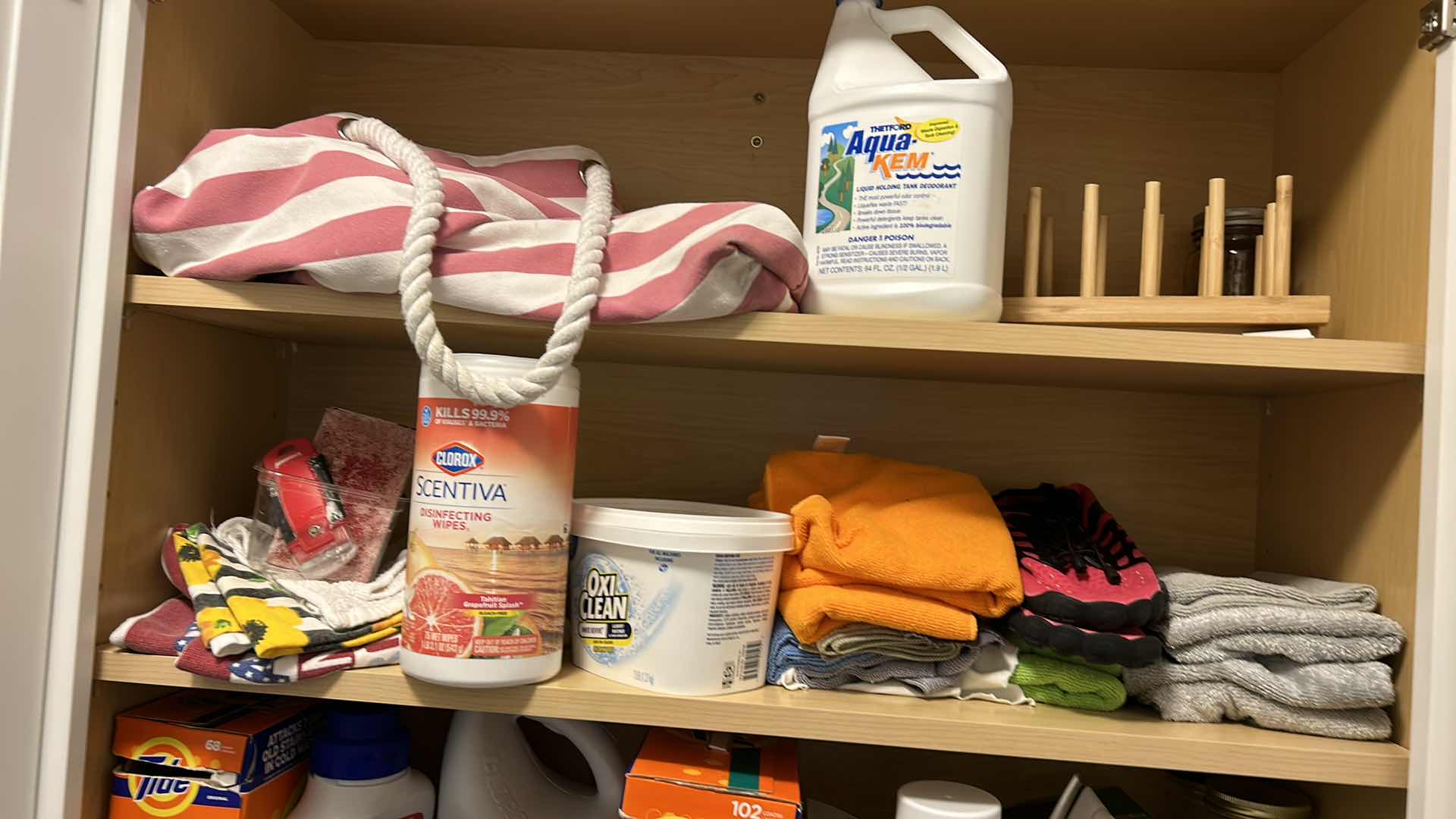 Photo 2 of CONTENTS OF CABINET IN LAUNDRY ROOM AND TOTE OF JARS