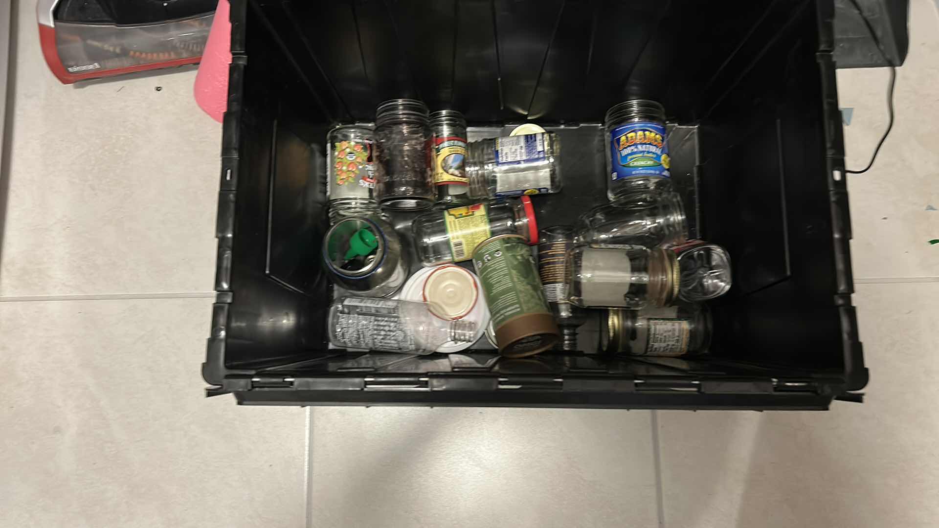 Photo 4 of CONTENTS OF CABINET IN LAUNDRY ROOM AND TOTE OF JARS