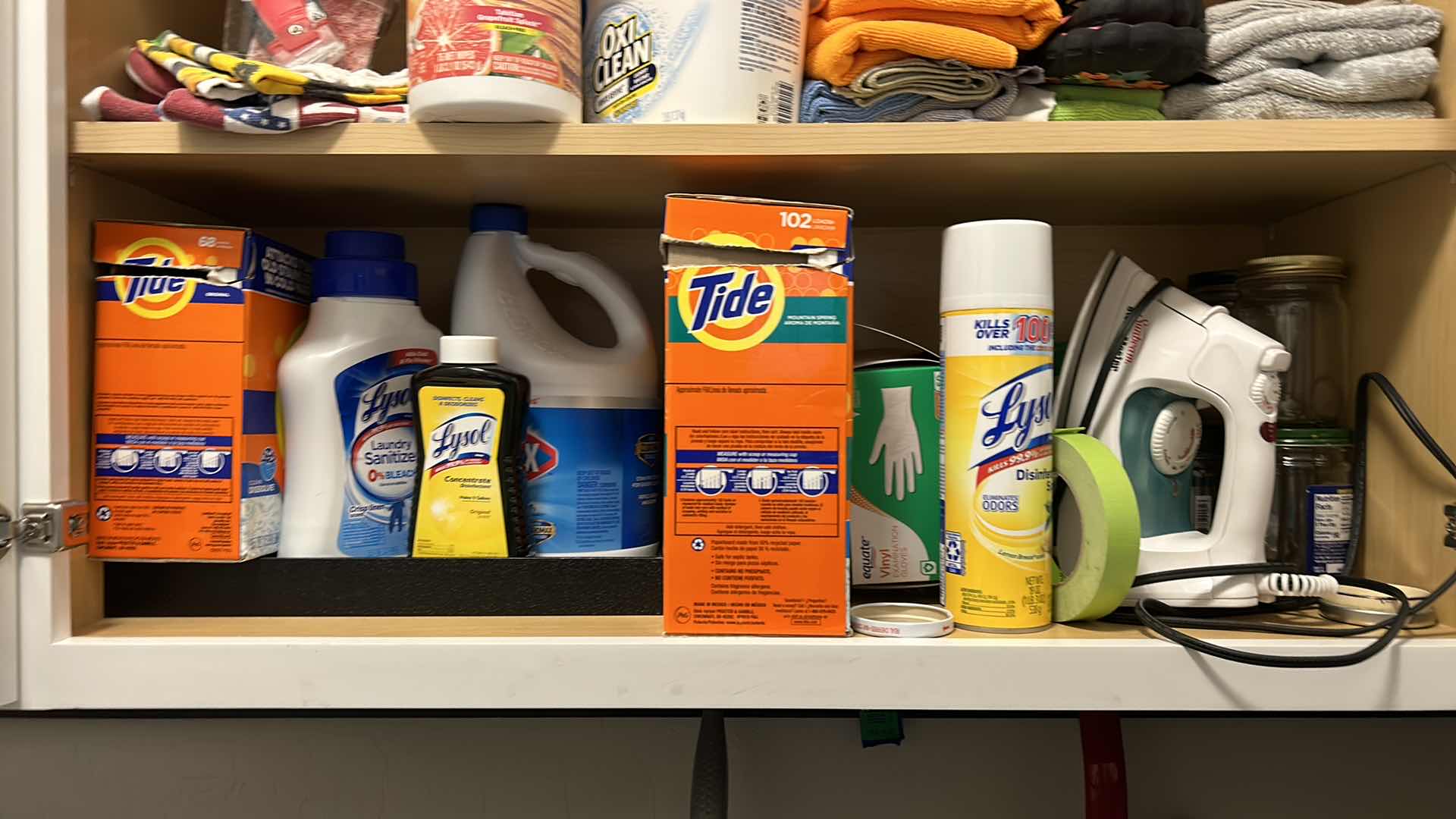 Photo 3 of CONTENTS OF CABINET IN LAUNDRY ROOM AND TOTE OF JARS