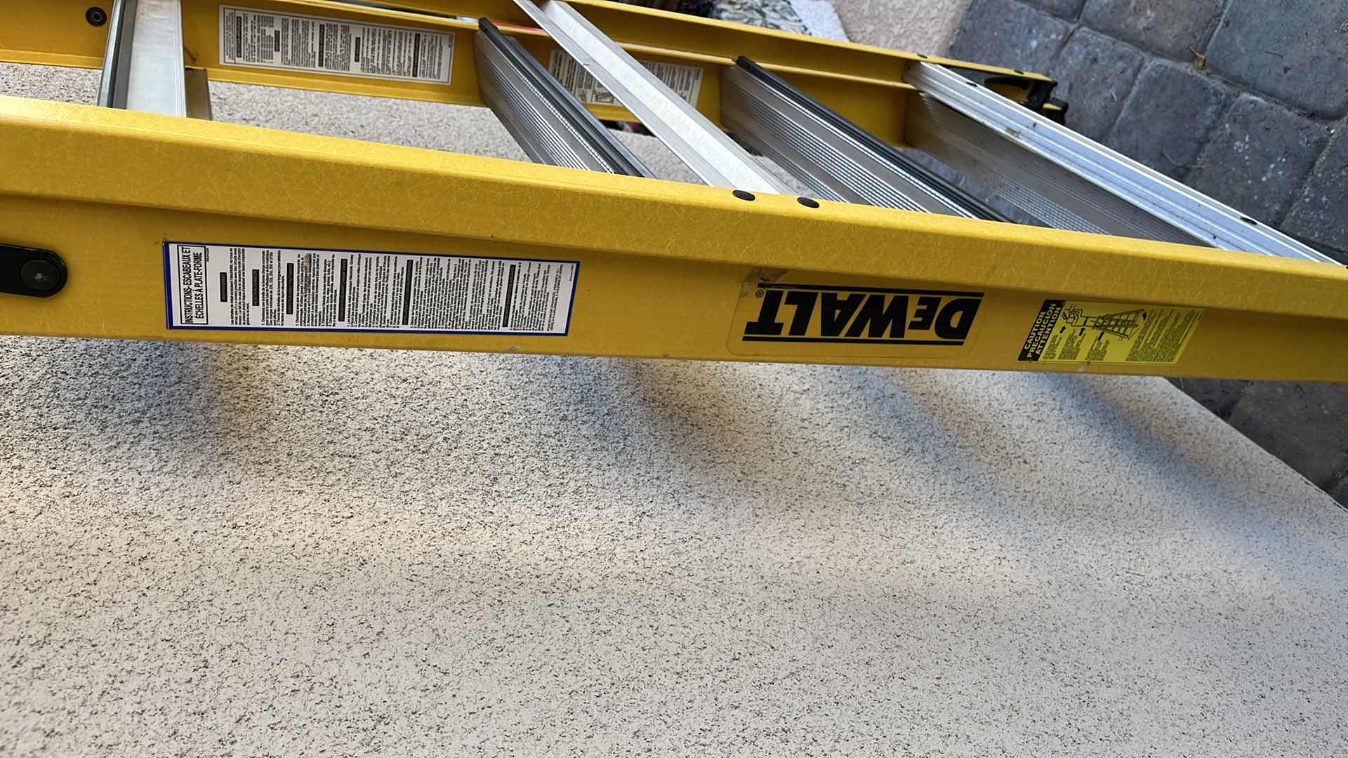 Photo 2 of DEWALT LADDER 68”, 250 LOAD CAPACITY