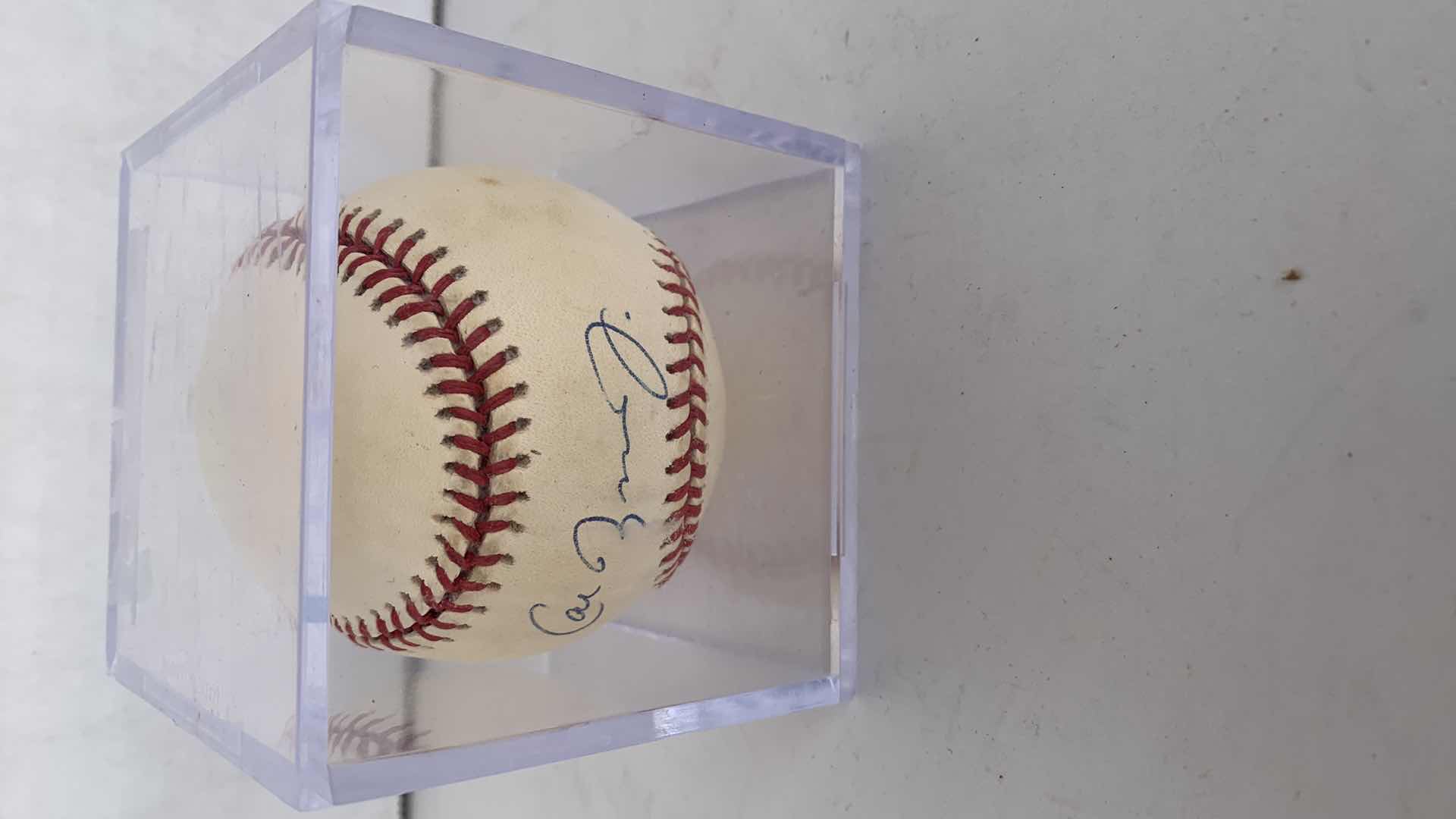 Photo 1 of BASEBALL CAL RIPKEN JR.  SIGNED BASEBALL UNAUTHENTICATED