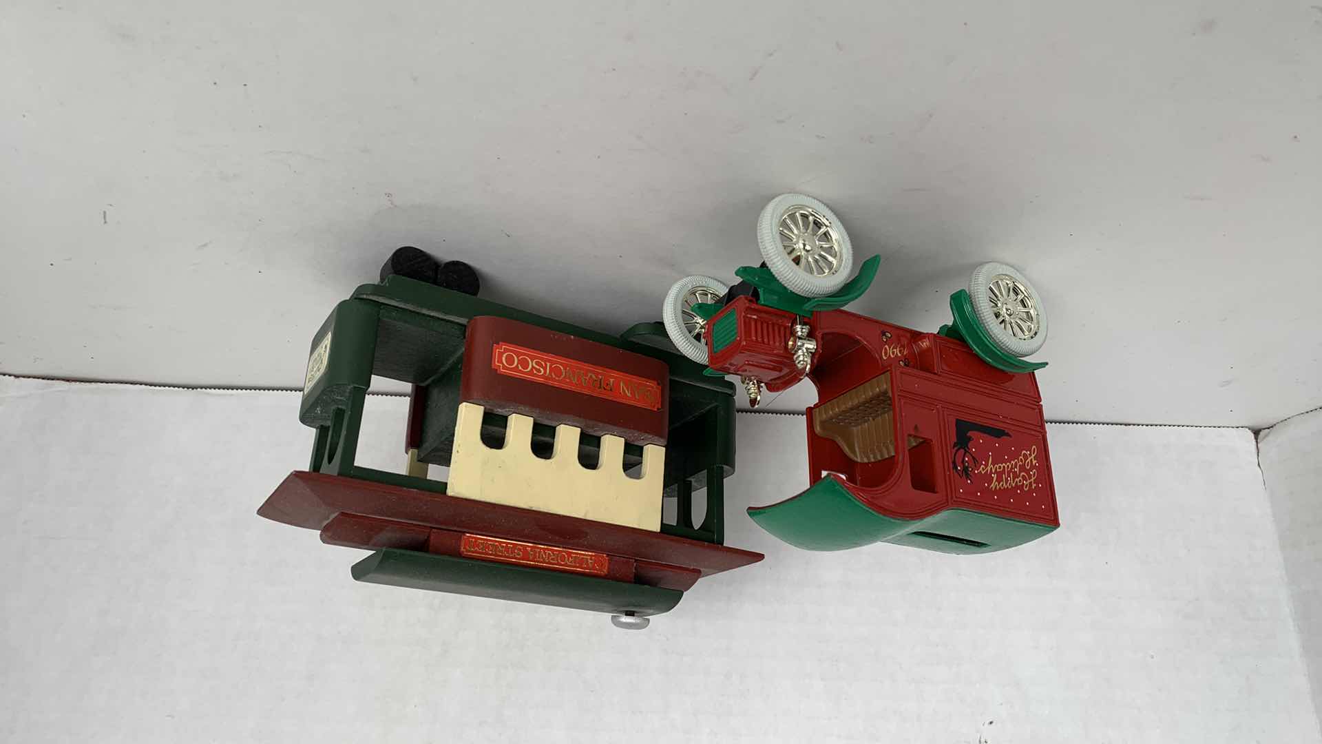 Photo 1 of COLLECTIBLE MUSIC BOX TROLLEY CAR AND ERTL FORDS FIRST DELIVERY VEHICLE